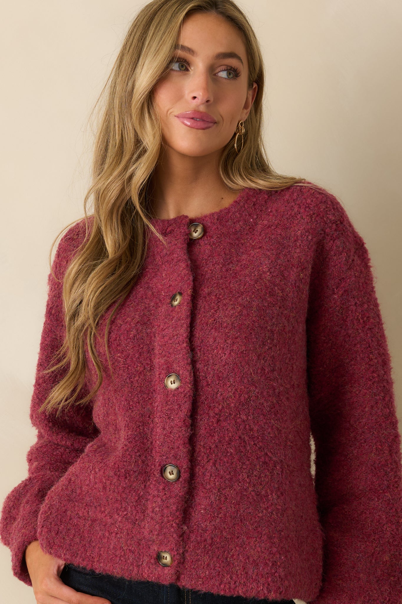 Cranberry cardigan featuring soft knit detailing and smooth button placket for a polished touch.