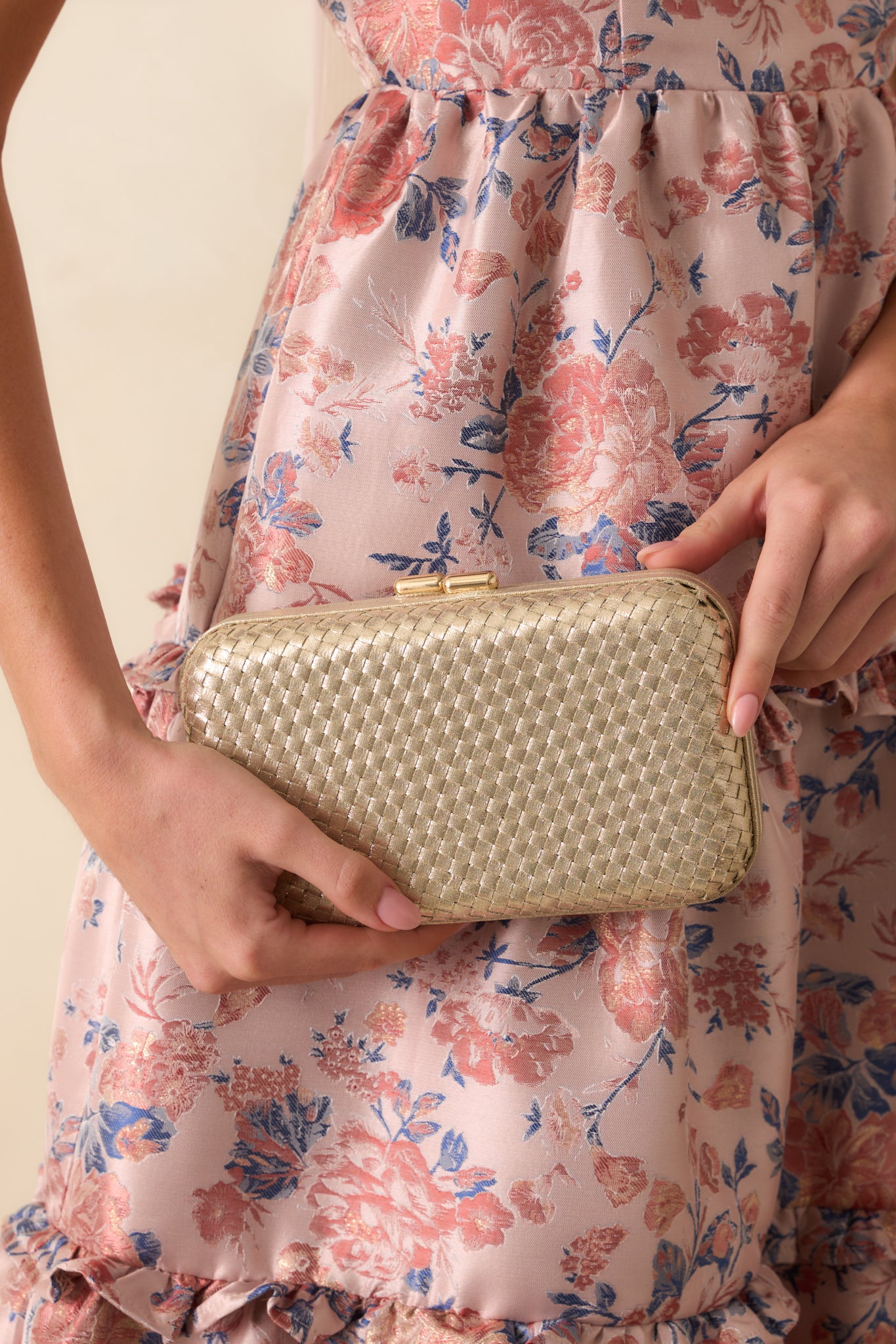 Cropped angled view highlighting the hard case body and hinged frame with top clasp closure.