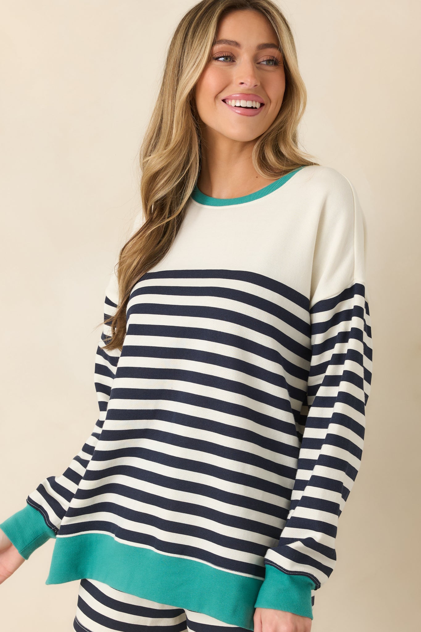 Cropped front shot emphasizing the relaxed fit and cotton-blend fabric with clean stripe alignment.