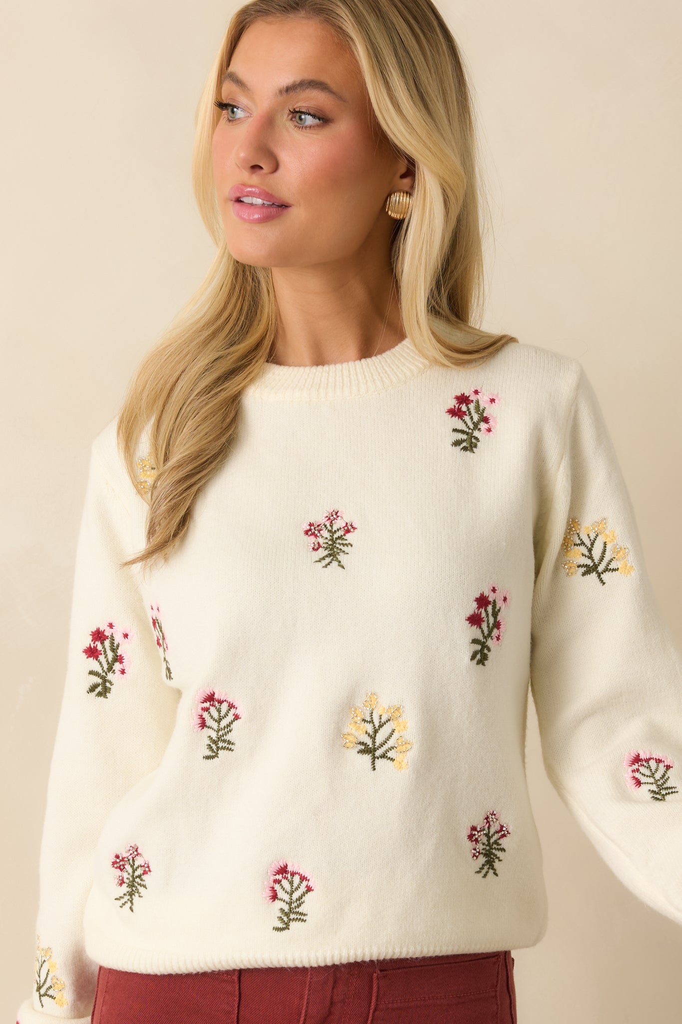 Cropped front view emphasizing subtle bead accents throughout the floral pattern.