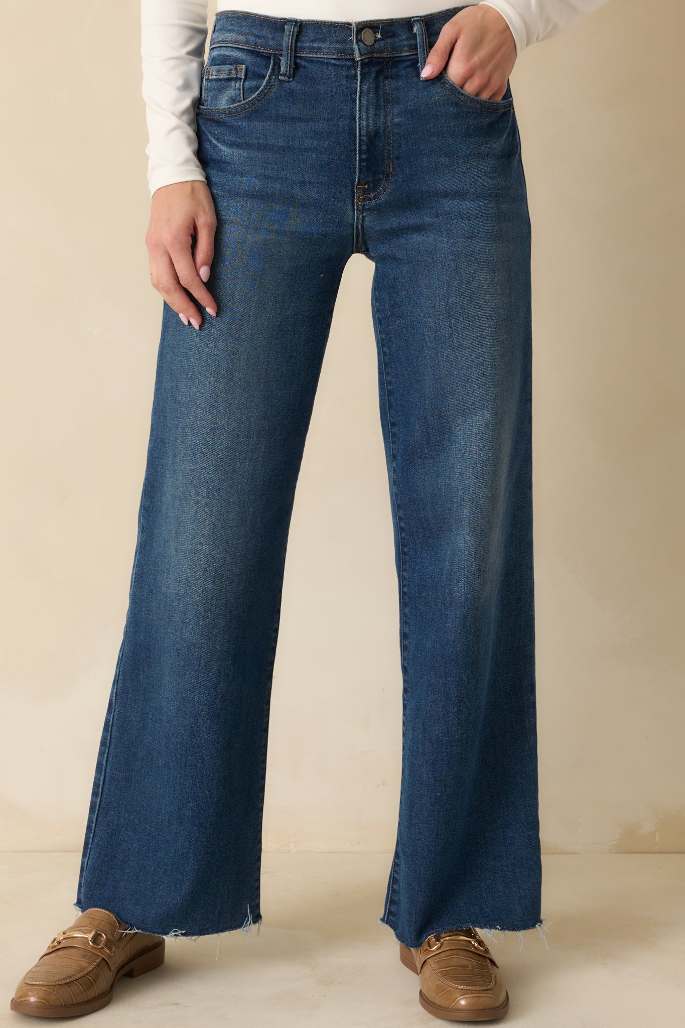 Cropped front view focusing on the high waist and front pocket details.