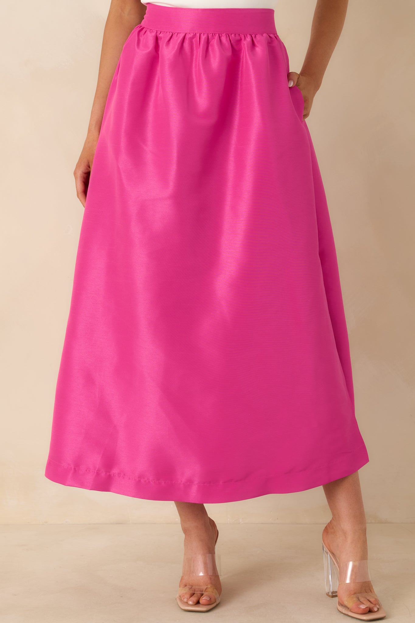 Cropped front view highlighting the high-rise waistband and gathered waist detail.