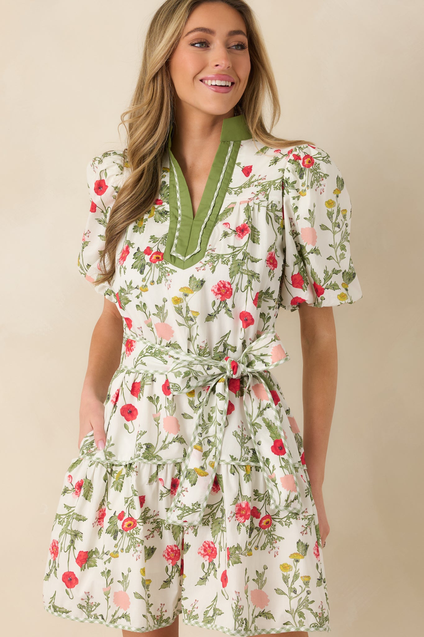 Cropped image highlighting the puff short sleeves and gathered shoulder seams.