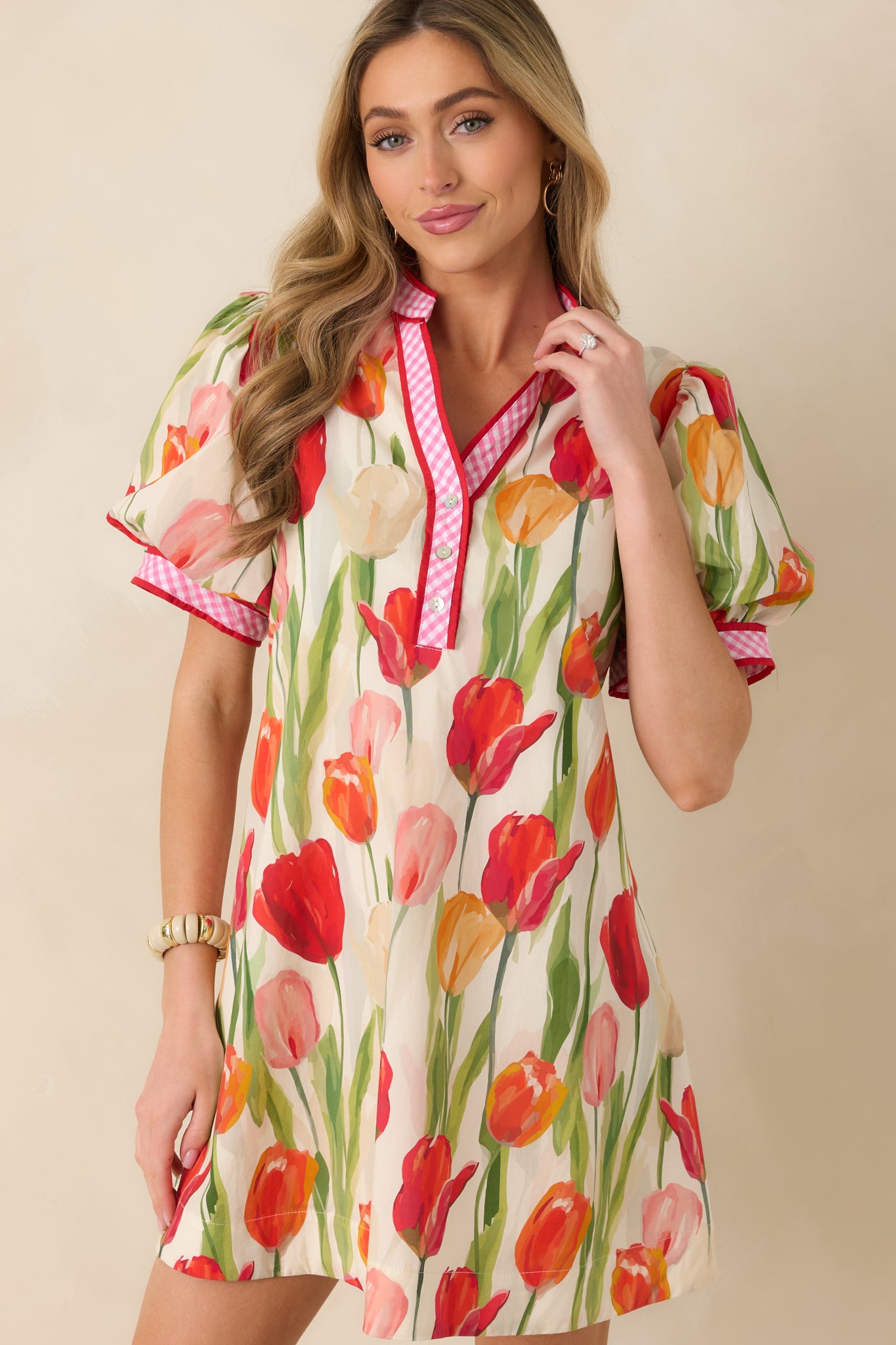 Cropped image highlighting the puff short sleeves and smooth fabric texture.