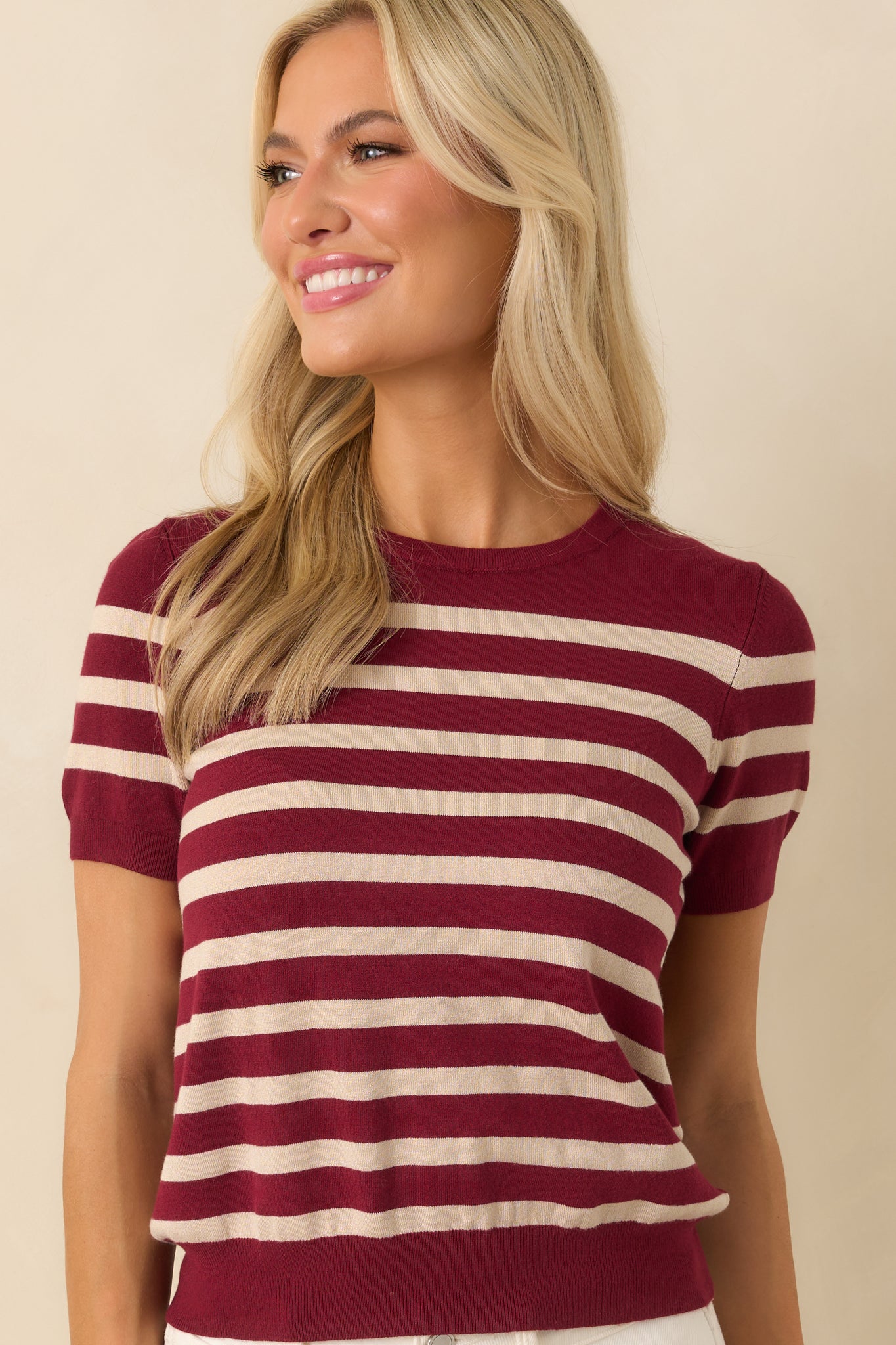 Cropped image centered on the stripe print across the chest and sleeve.