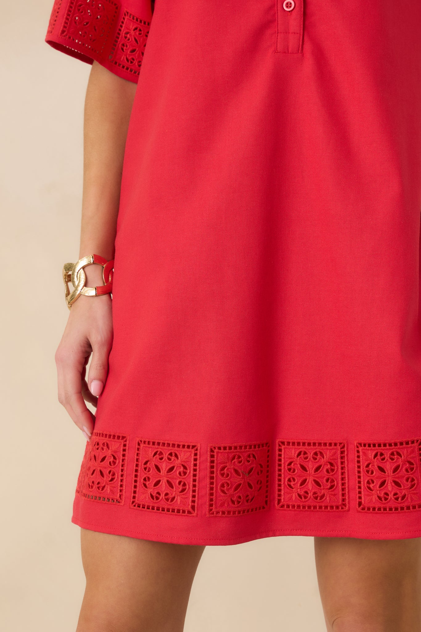 Cropped perspective showing the hemline cutout design and smooth fabric texture.