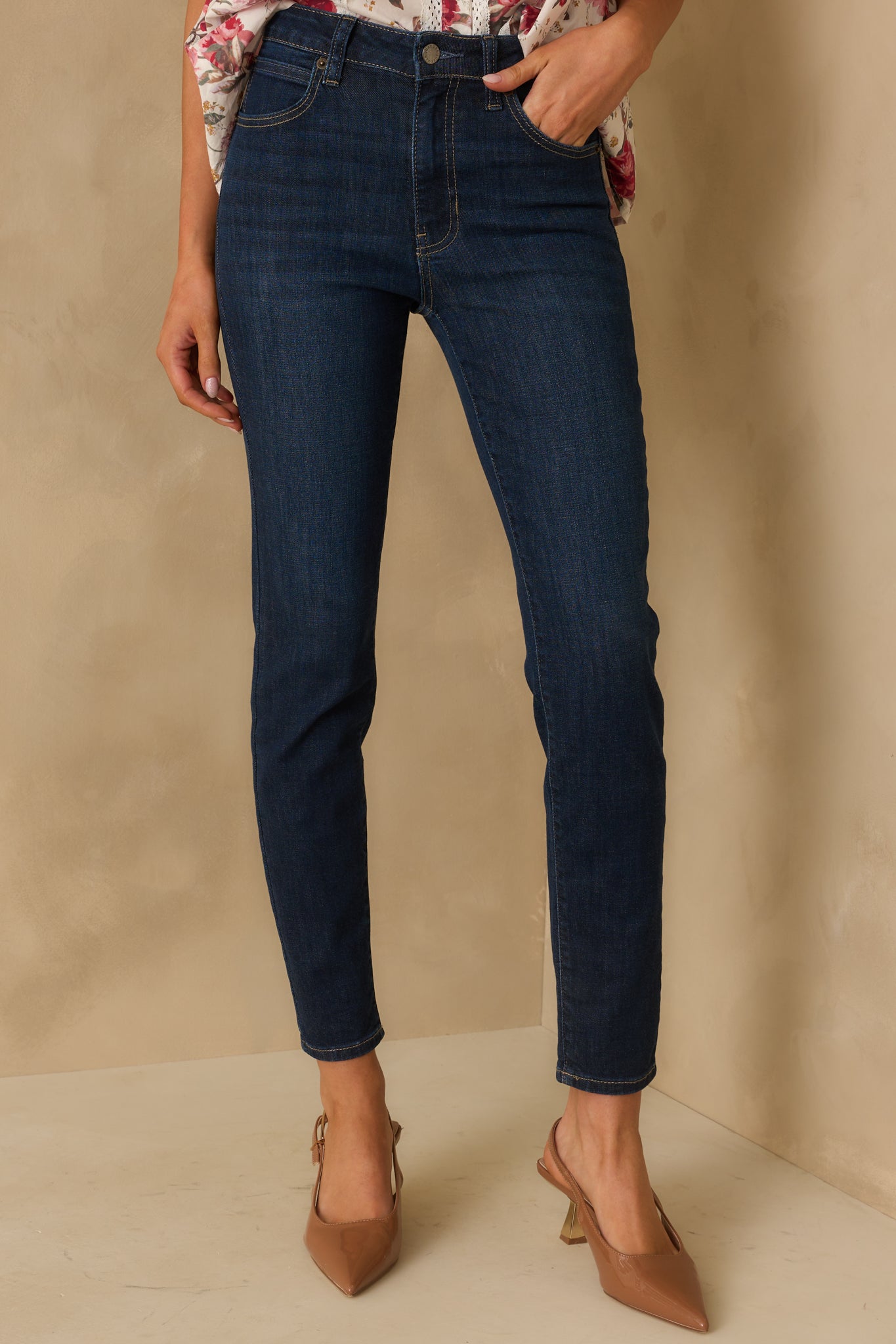 Cropped look at the skinny leg cut highlighting the dark wash fabric.