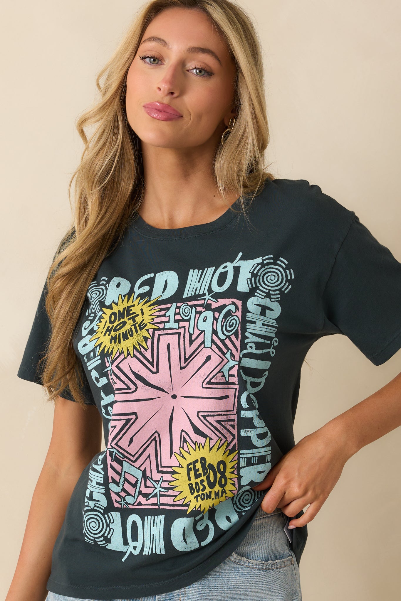 A cropped front view emphasizing the bold pink star design and yellow accents in the band graphic.