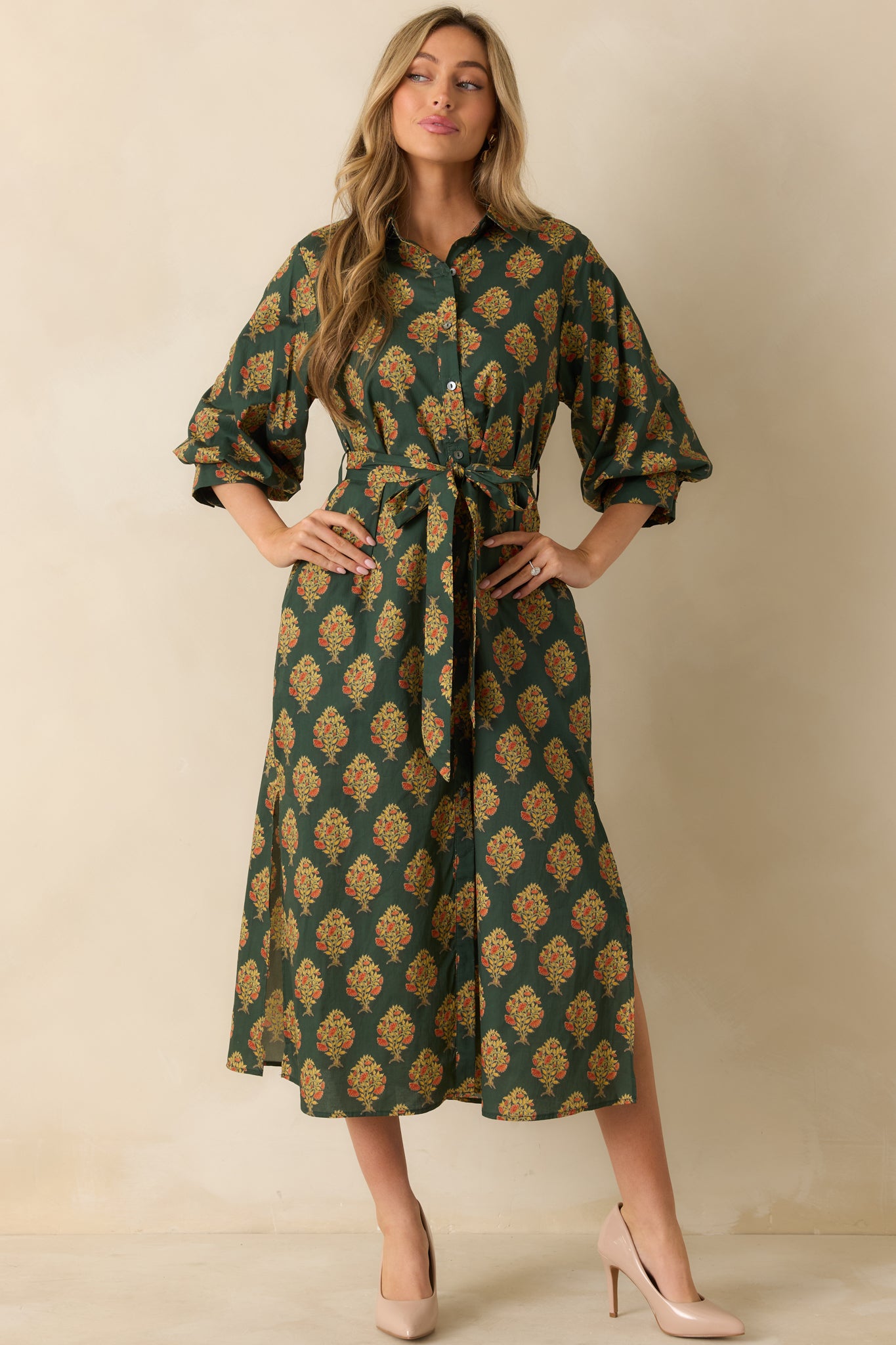 Maxi dress in dark green with half sleeves, buttoned cuffs, and relaxed fit through the body.