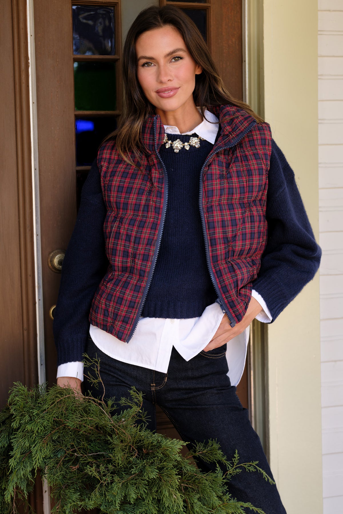 Deep navy sweater with a round neckline finished in ribbed knit trim.