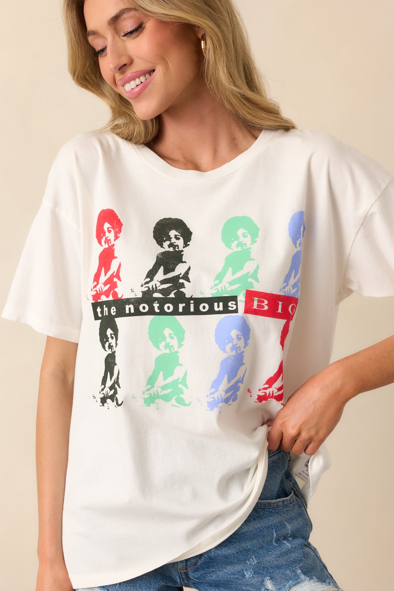 Detailed shot of the tee’s relaxed fit and the colorful graphic print, highlighting the iconic artwork.