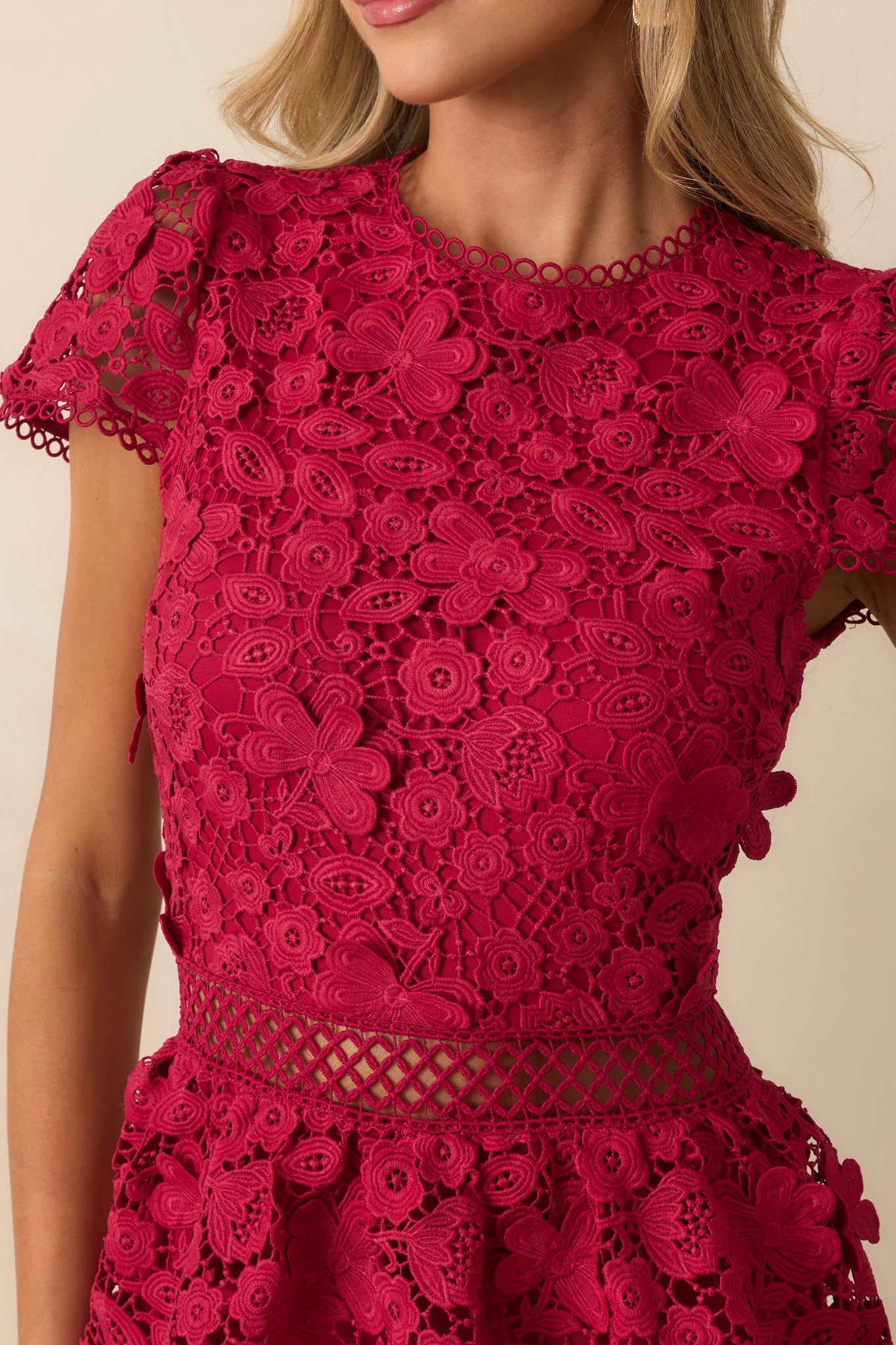 Detailed view of the sheer waist panel and intricate guipure lace pattern