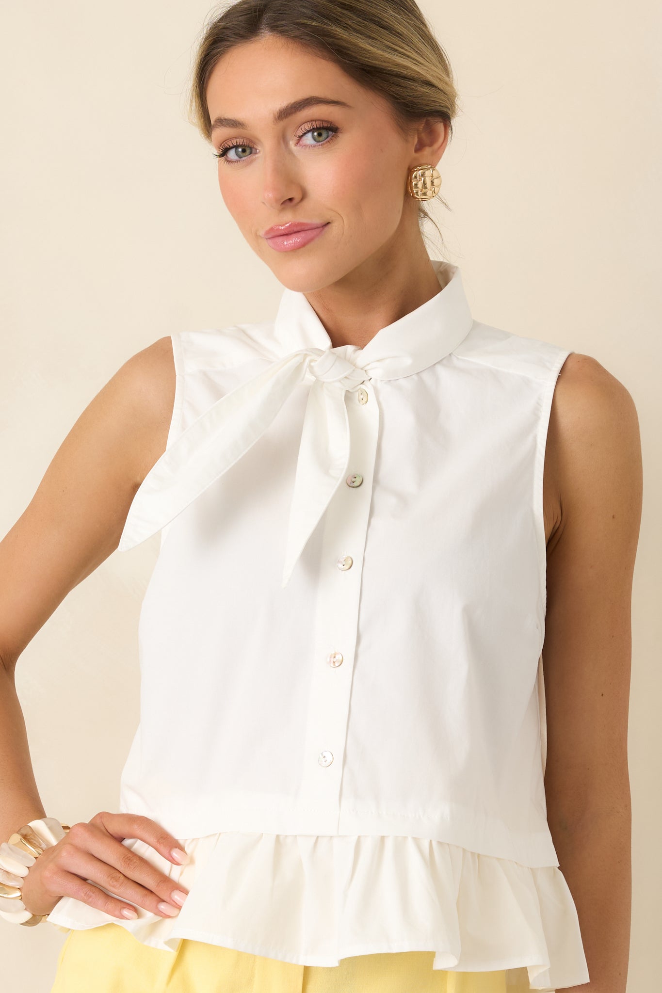 Detailed view of tie neckline and lightweight flowing fabric.