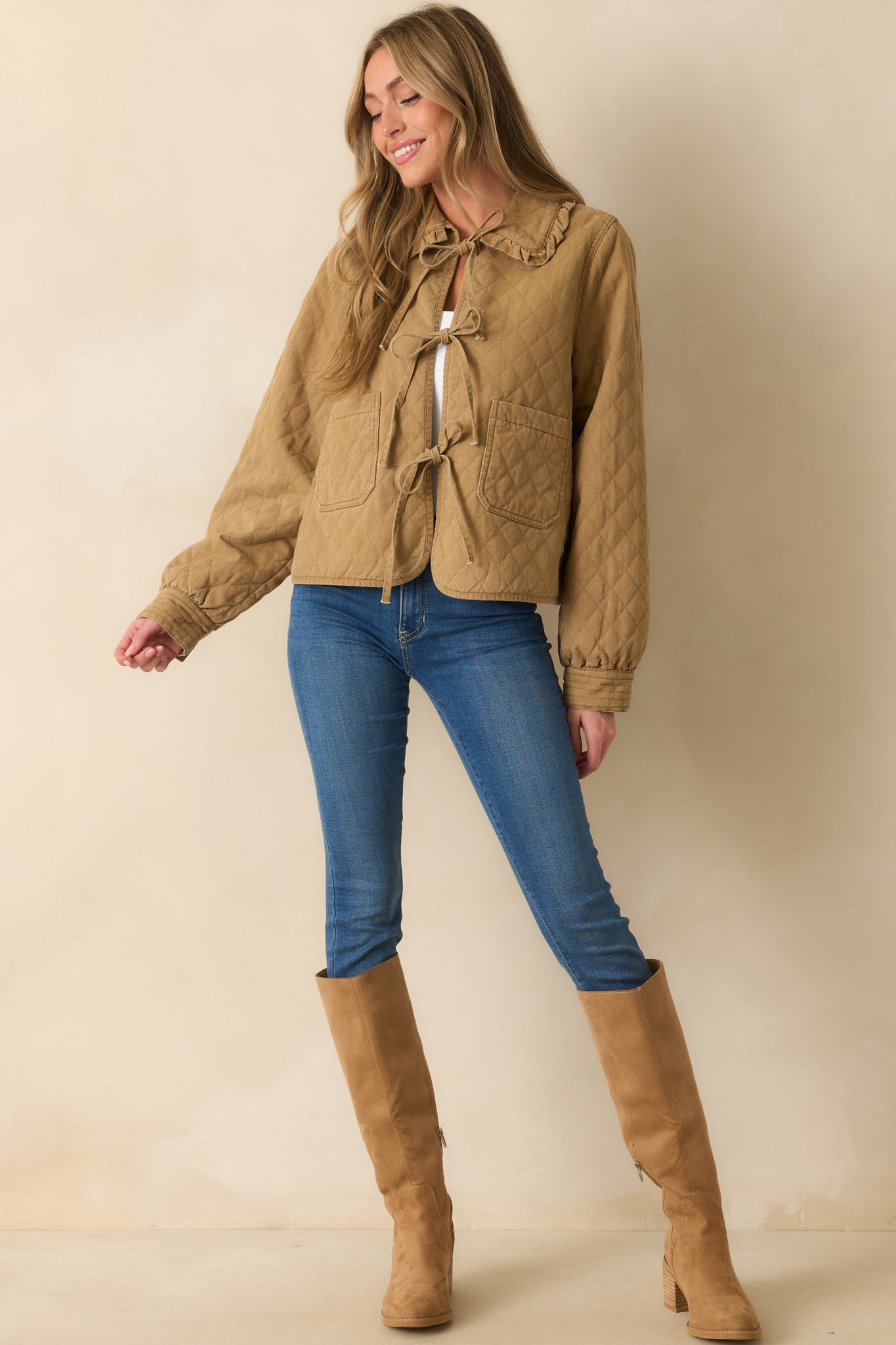 Diamond stitch jacket in khaki brown featuring three self-tie bow front closures and functional front patch pockets.