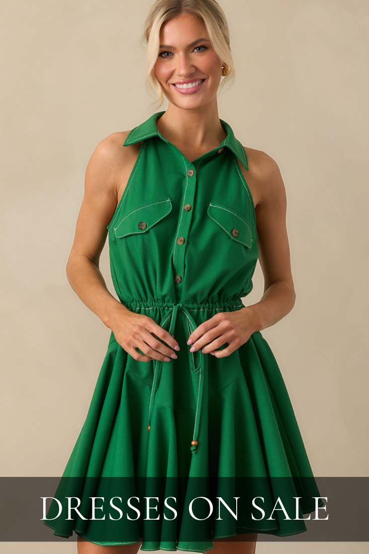 Women’s dresses on sale featuring a sleeveless green mini dress with a flattering fit.