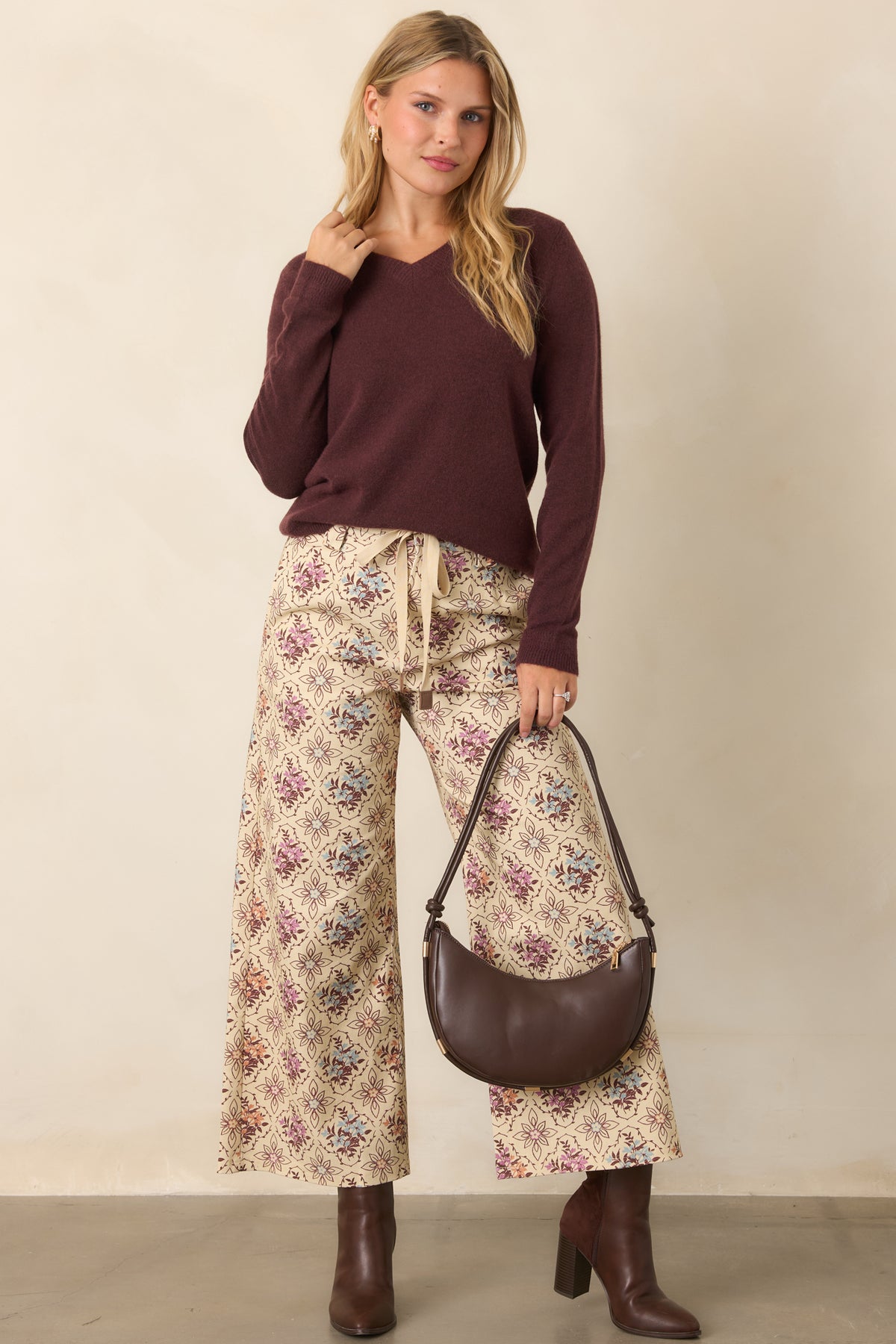 Cotton-rich pants showcasing vintage-inspired purple, blue, and peach floral medallions with relaxed wide legs.