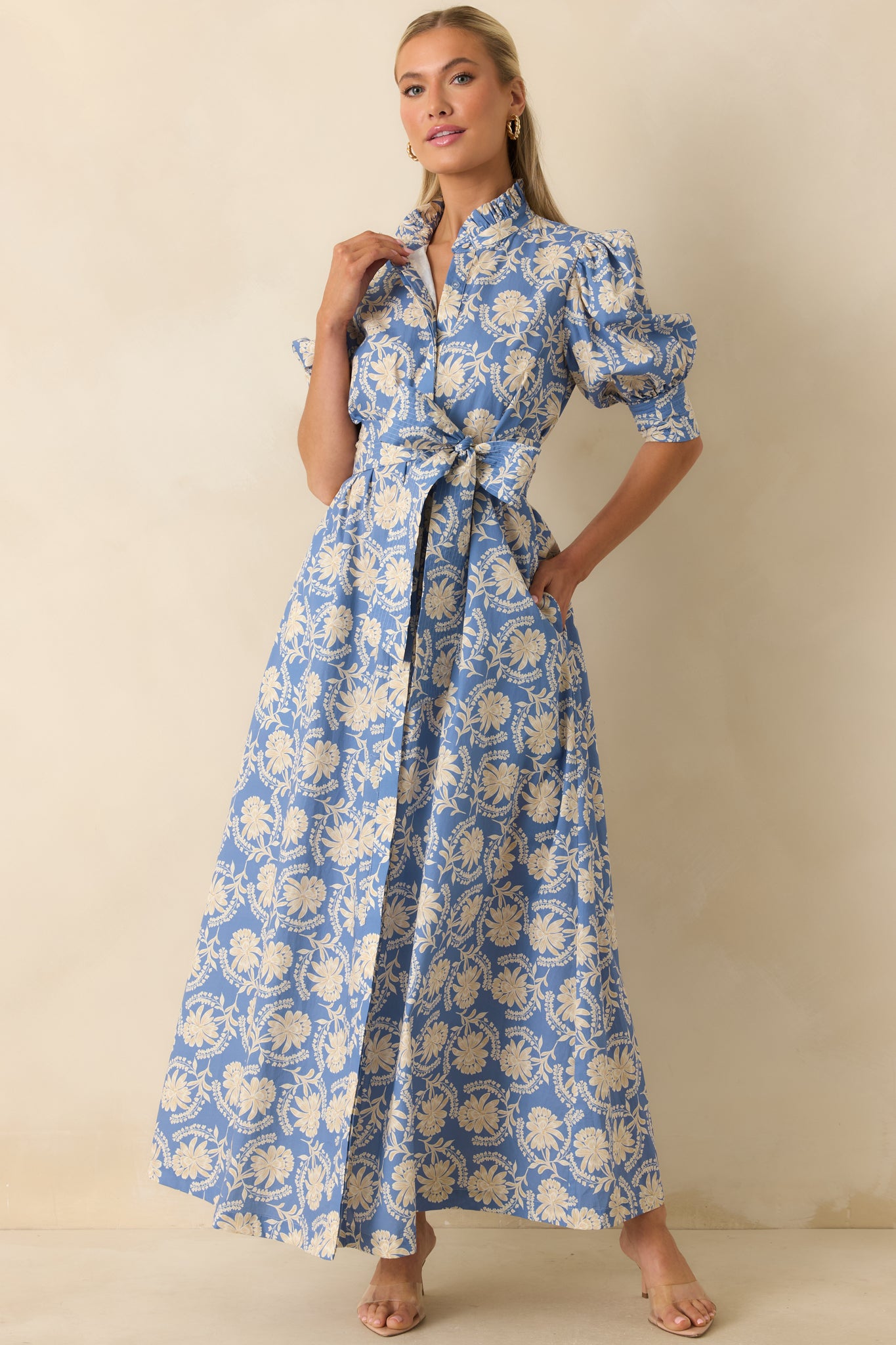 Elegant floral maxi dress showcasing a ruffled stand collar, split neckline, self-tie waist, and graceful full-length silhouette.