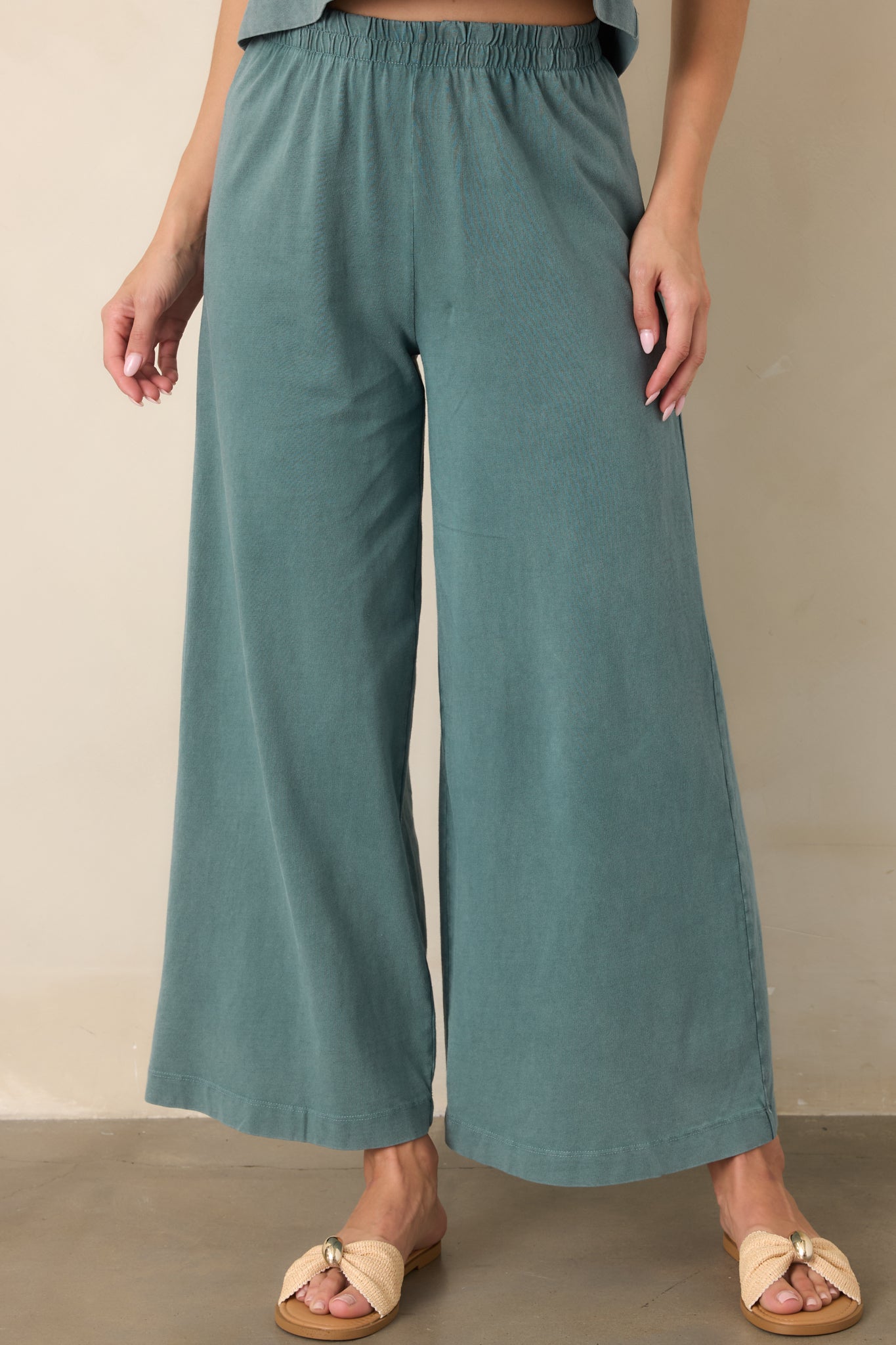 Emerald Cove cotton jersey pants showcasing the side pocket opening and relaxed fit through the upper leg.