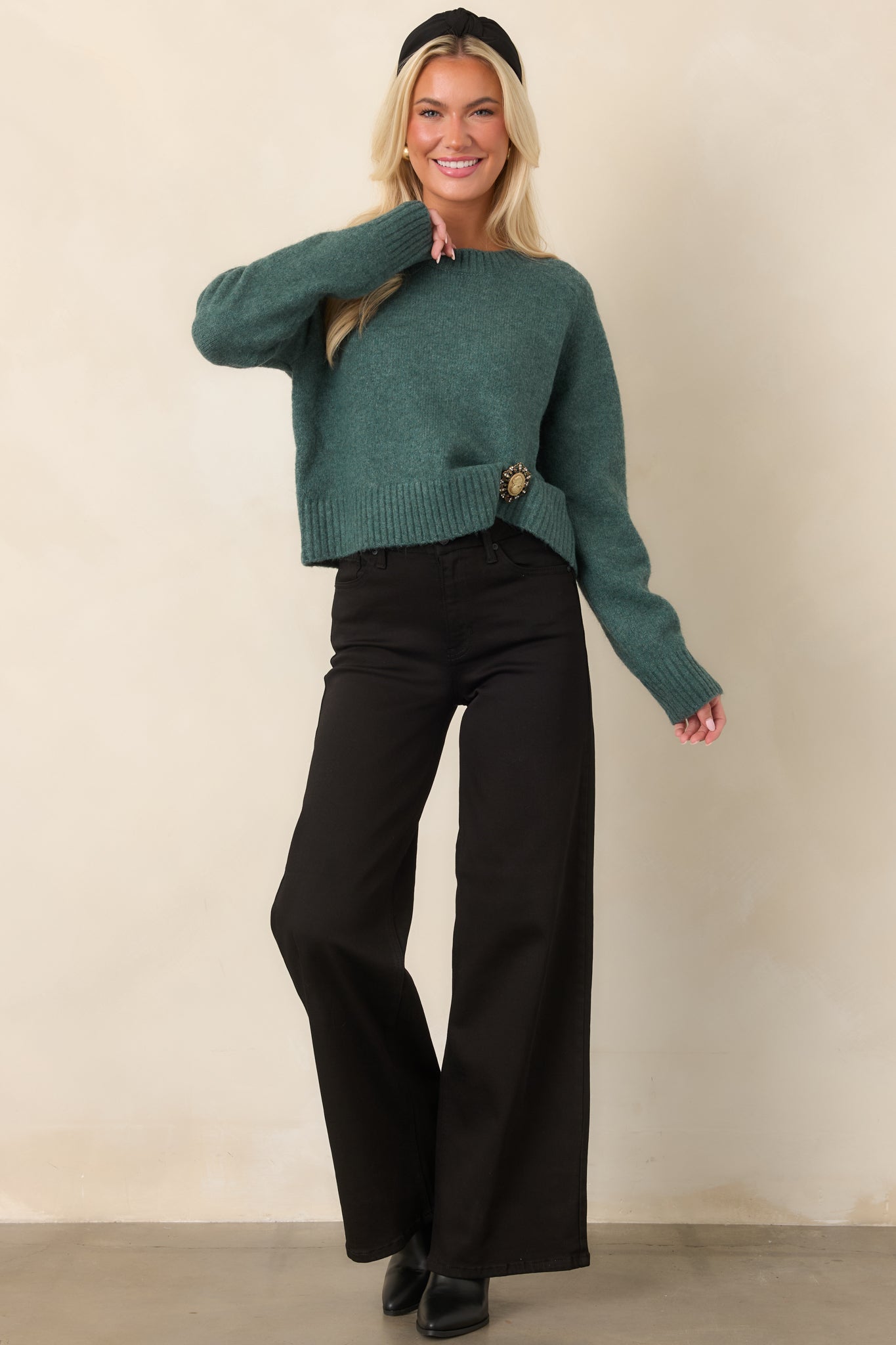 Emerald Cove green fuzzy knit top with a classic crew neckline, long sleeves, relaxed fit, and slightly cropped length.