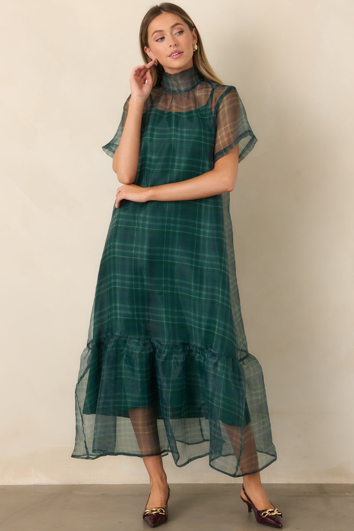 Emerald plaid maxi dress with sheer short sleeves, a high neckline, and airy layered construction.