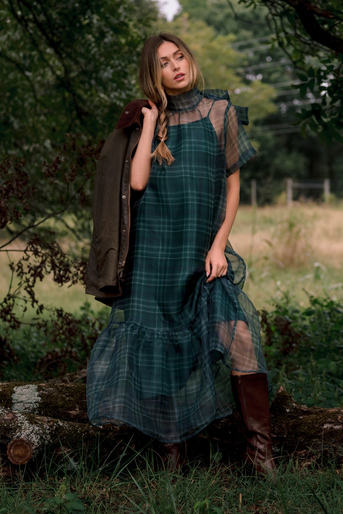 Rich emerald maxi dress with a sheer plaid overlay, coordinating slip, and relaxed silhouette.