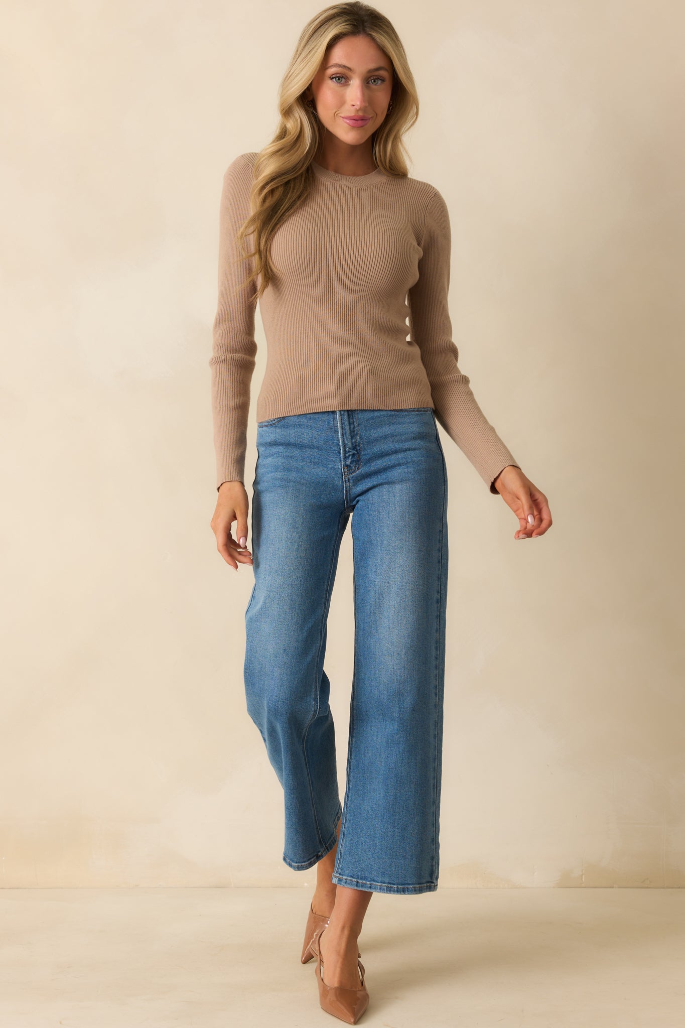 Fitted taupe ribbed knit sweater with clean lines and straight hem.