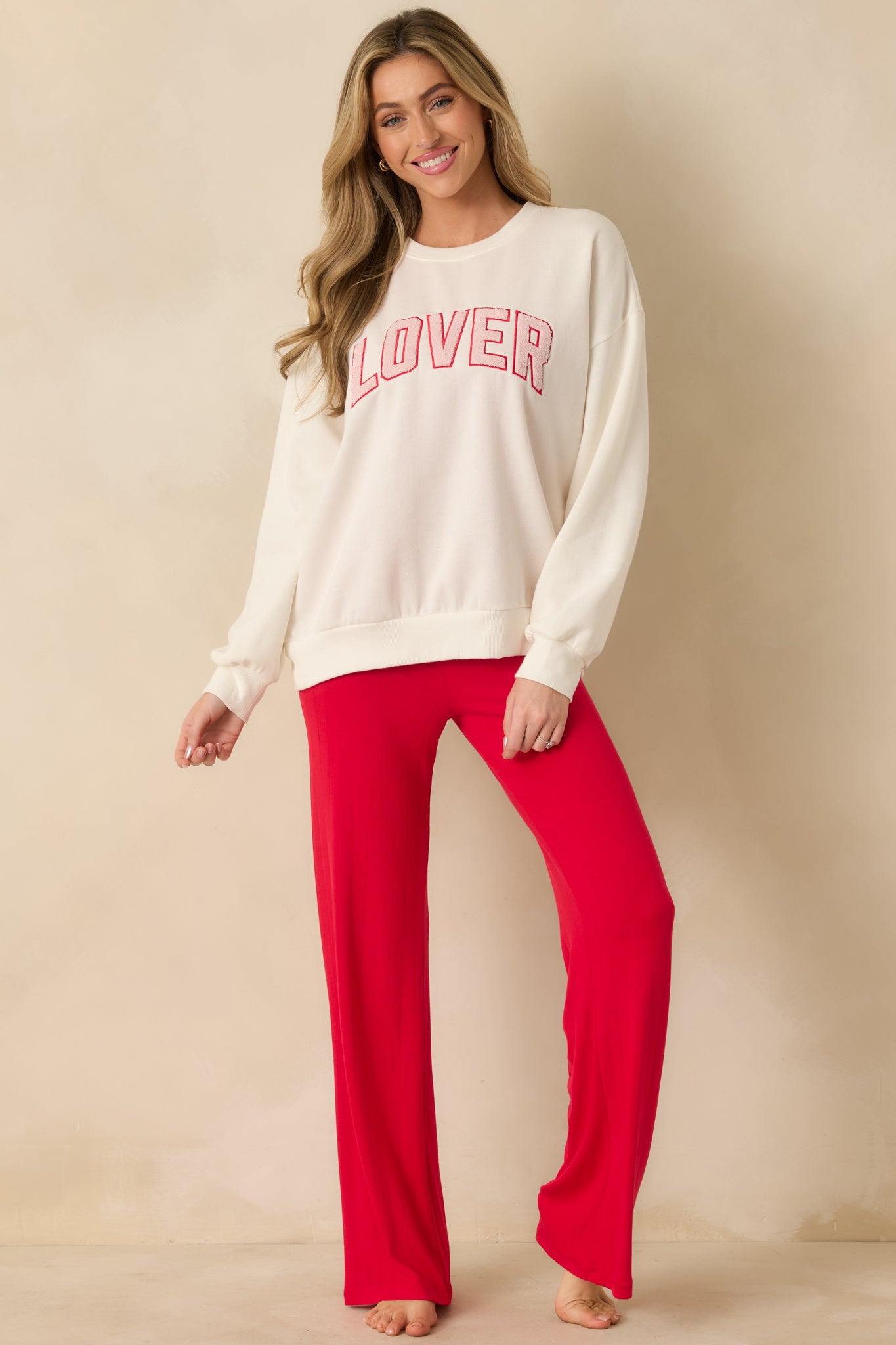 Soft midweight fleece sweatshirt showcasing long sleeves with ribbed cuffs and hem