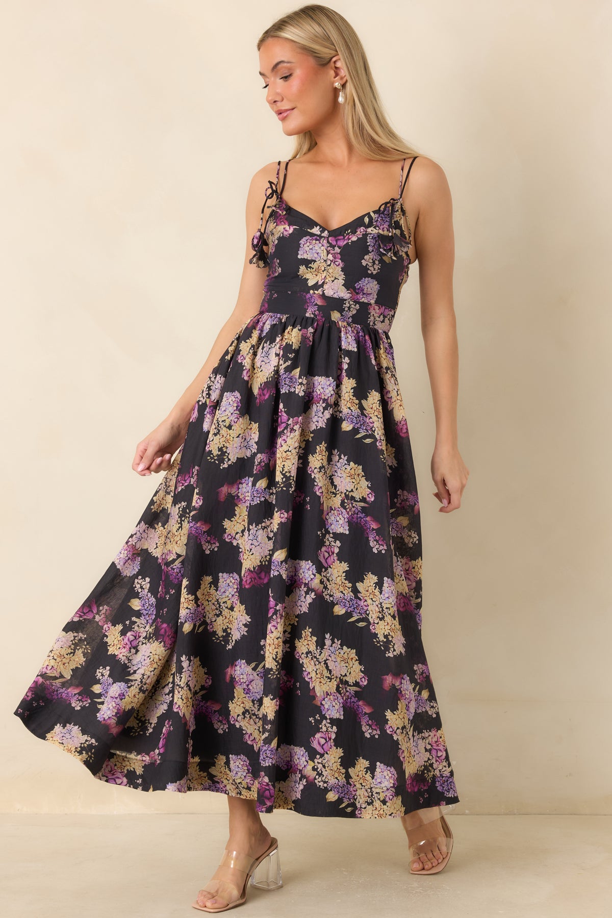 Floral fit-and-flare dress with a semi-sheer overlay, creamy yellow blossoms, and a full gathered skirt.