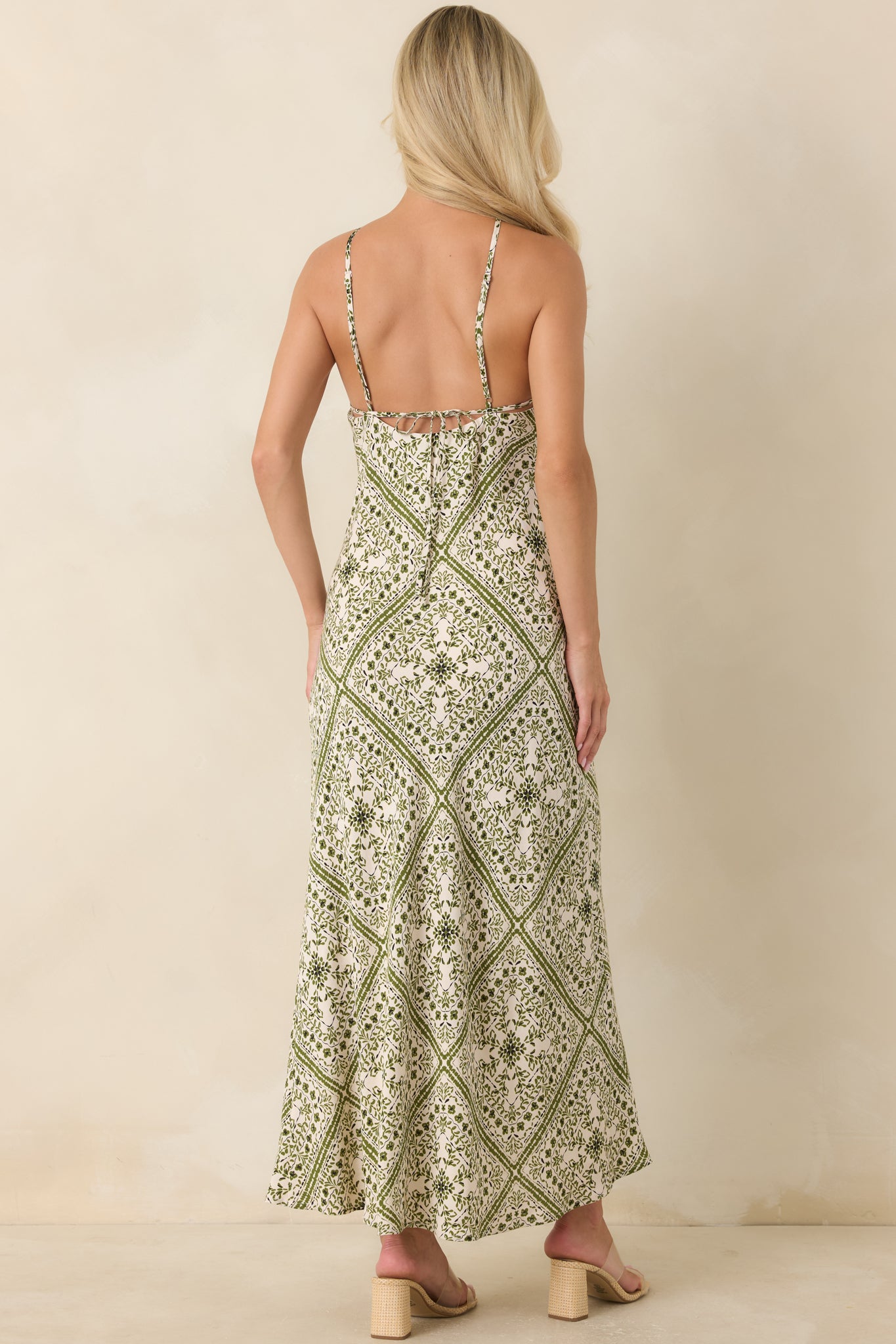 Rear of the floral midi dress featuring a graceful low scoop back and sleek column silhouette.