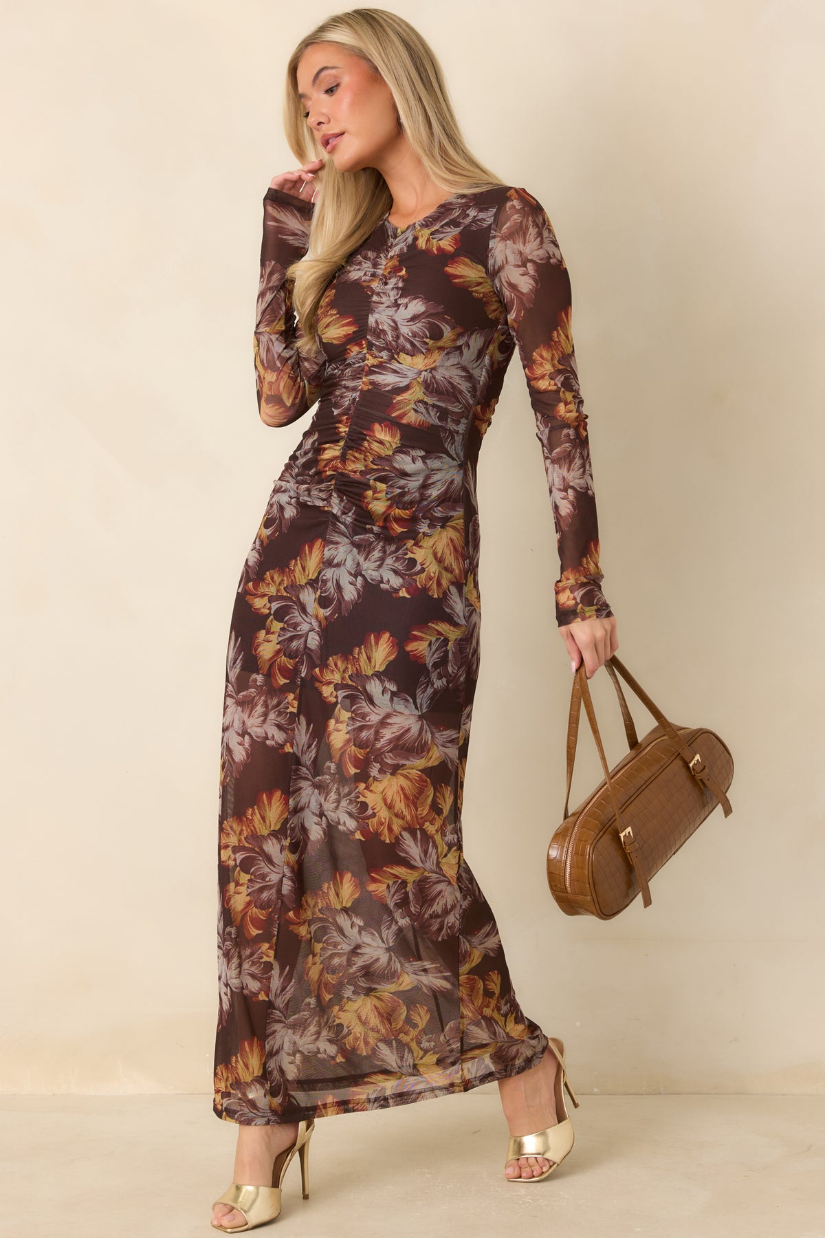 Long-sleeve mesh dress with warm-toned florals and a softly rounded high neckline.