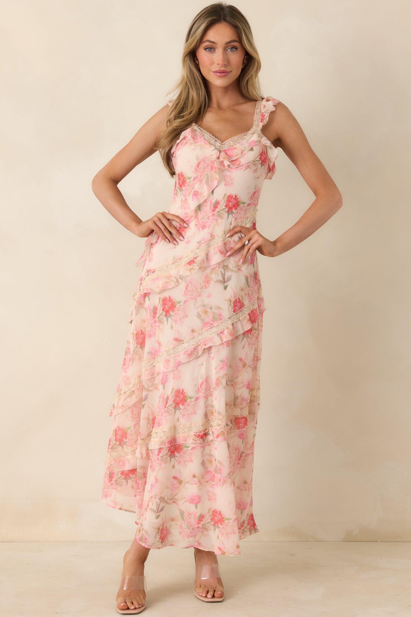 Ethereal floral midi dress, with a diagonal ruffle design and softly layered sheer fabric.