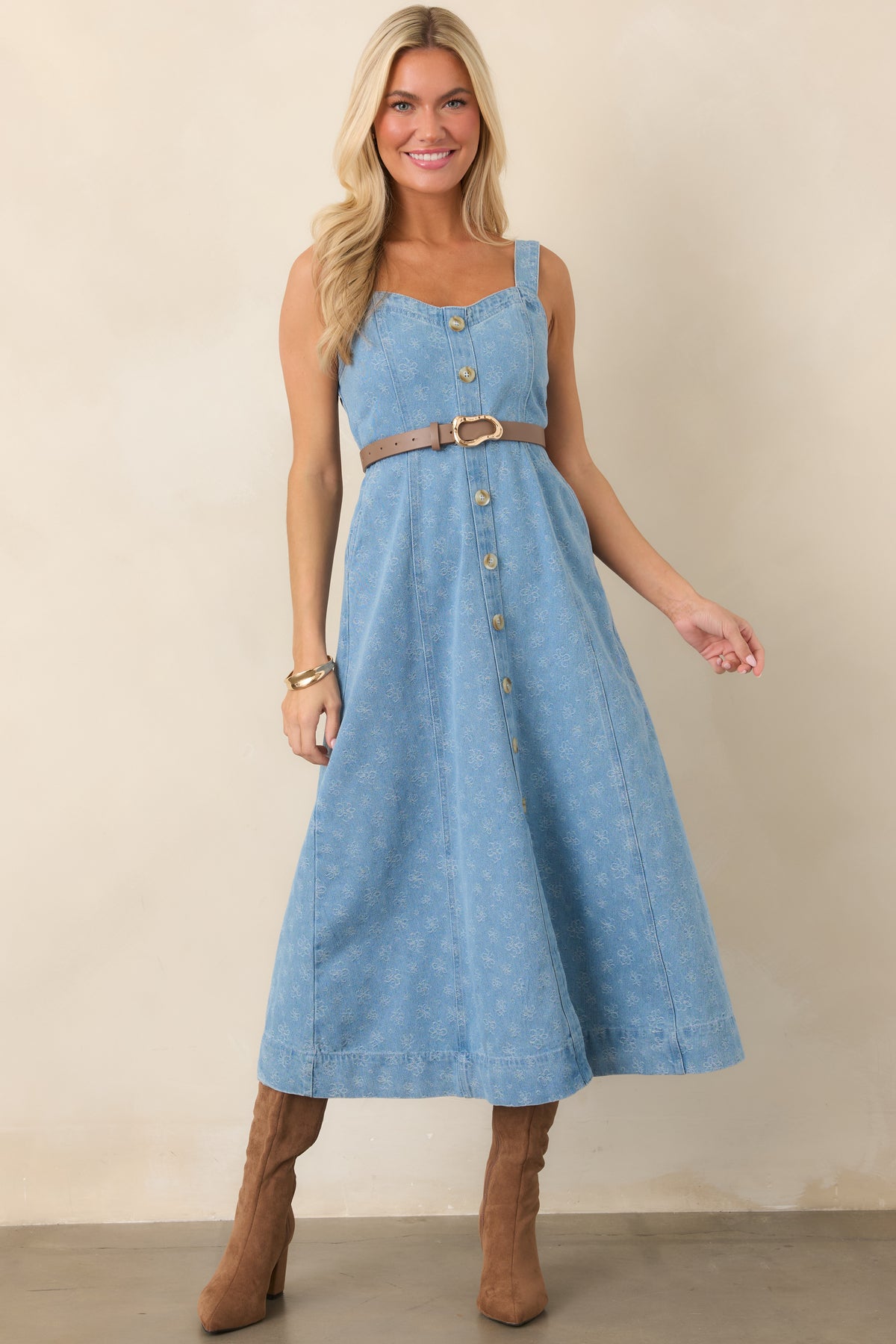 Floral-print denim dress featuring decorative buttons, a flattering fitted bodice, and an effortlessly polished midi length.