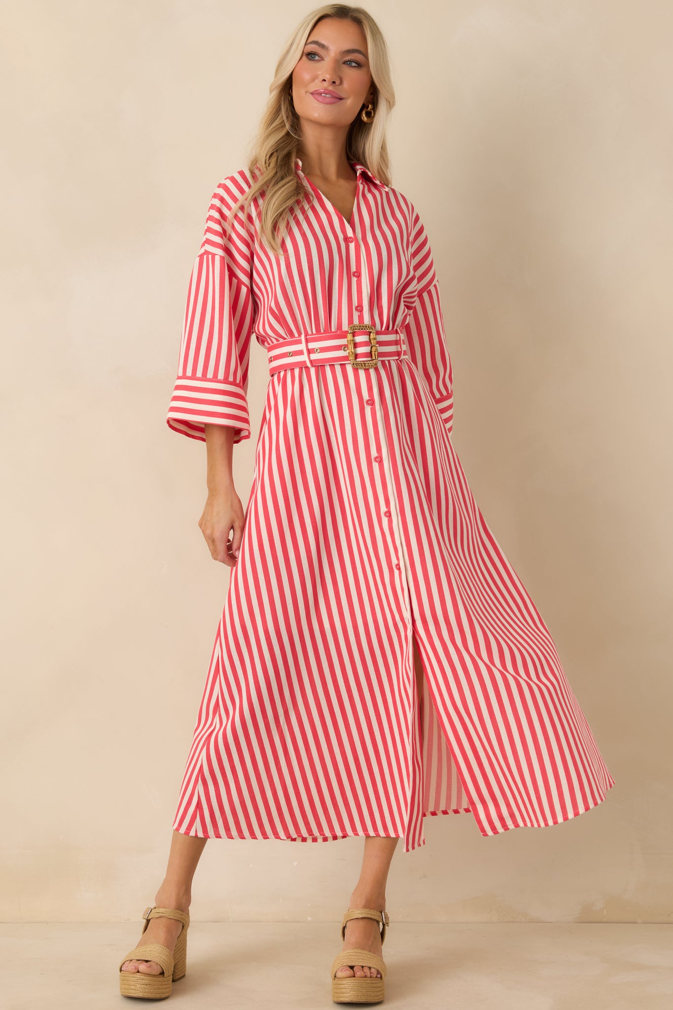 Flowing red striped maxi shirt dress with structured collar, airy woven fabric, and effortless full-length fit