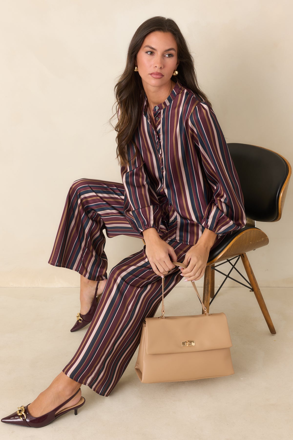 Flowing wide leg pants showcasing the rich striped palette and subtle sheen of satin.