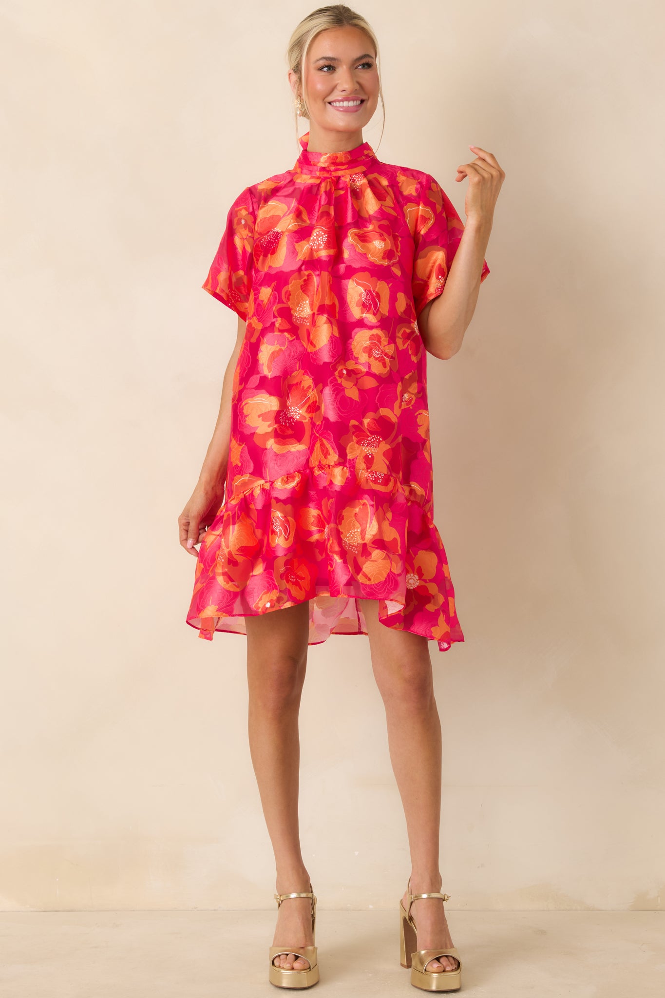 Flowy mini dress with gathered bodice, airy sleeves, and flattering silhouette for easy movement.