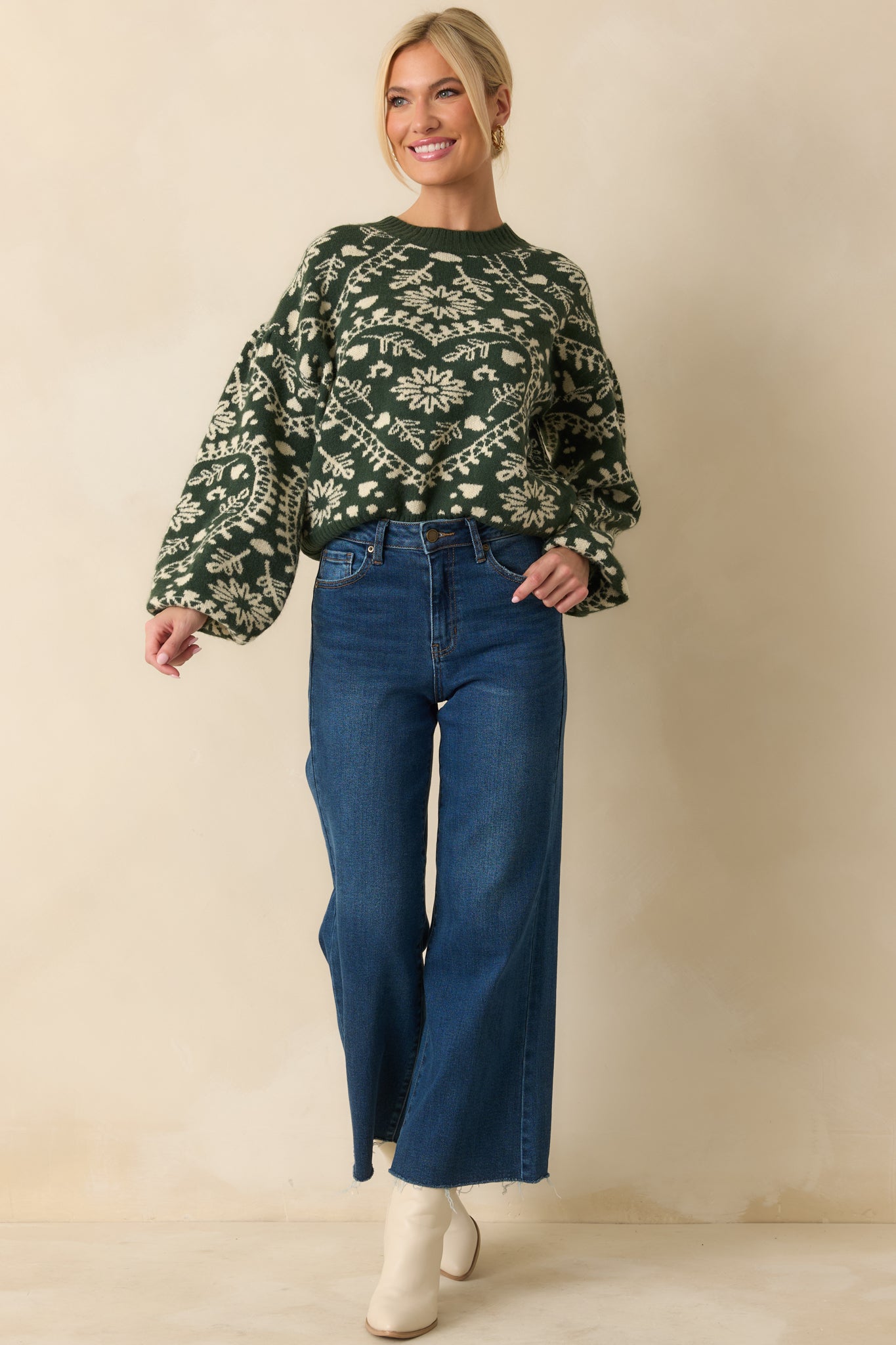 Forest green heart-pattern sweater featuring drop shoulders, long balloon sleeves, and a comfortable pullover silhouette.