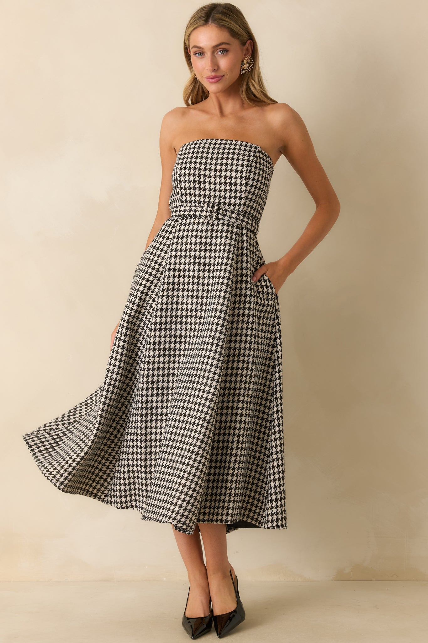 Front view highlighting the structured A-line silhouette and classic houndstooth pattern.