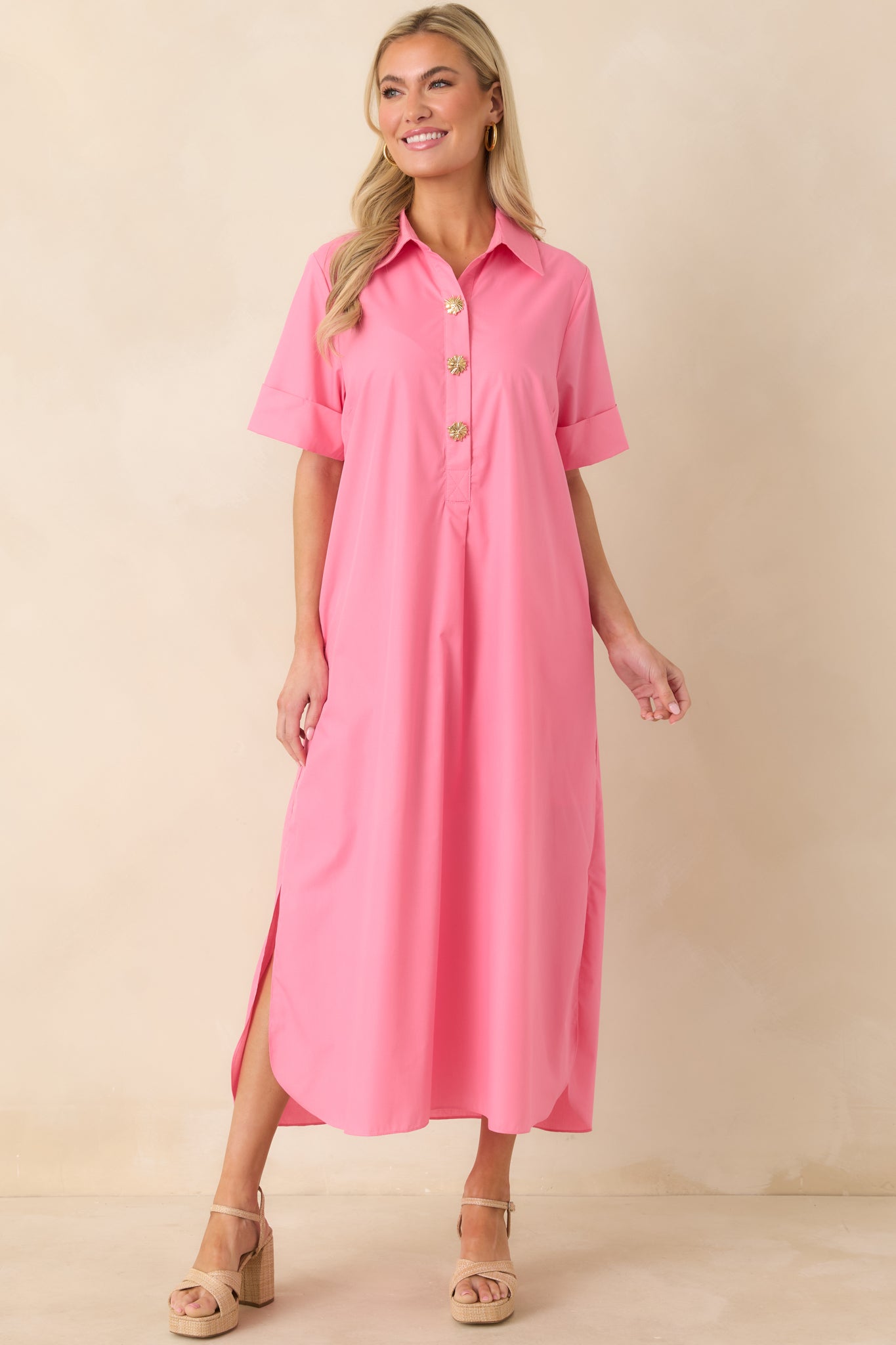 Full-length front angle highlighting the relaxed fit and smooth drape of the pink fabric.