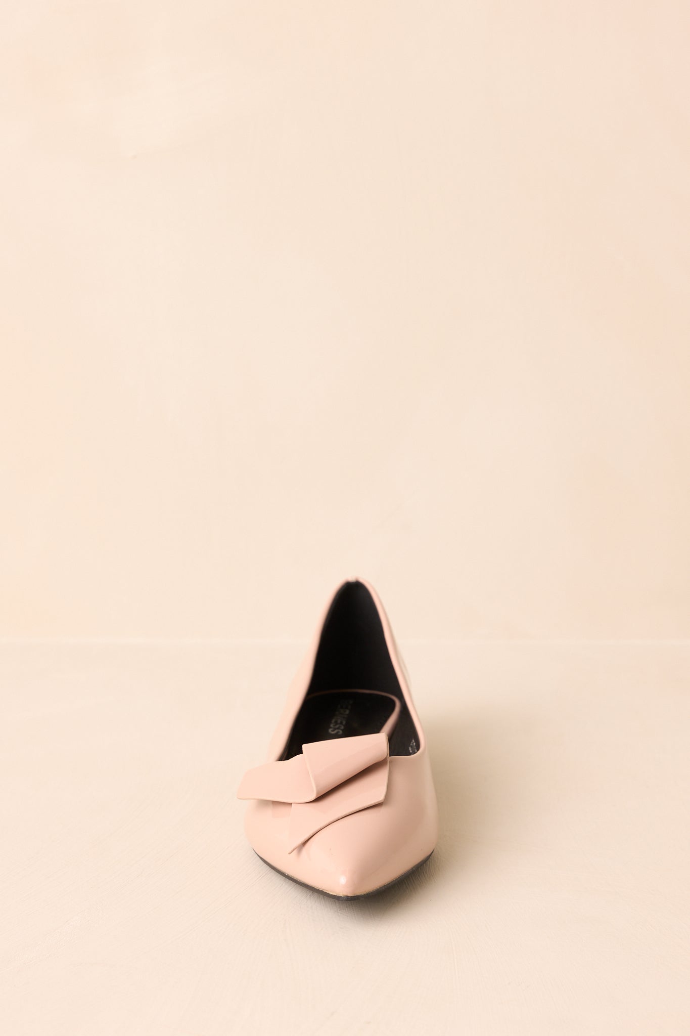 Front angle of the flats, emphasizing the folded bow and glossy finish.