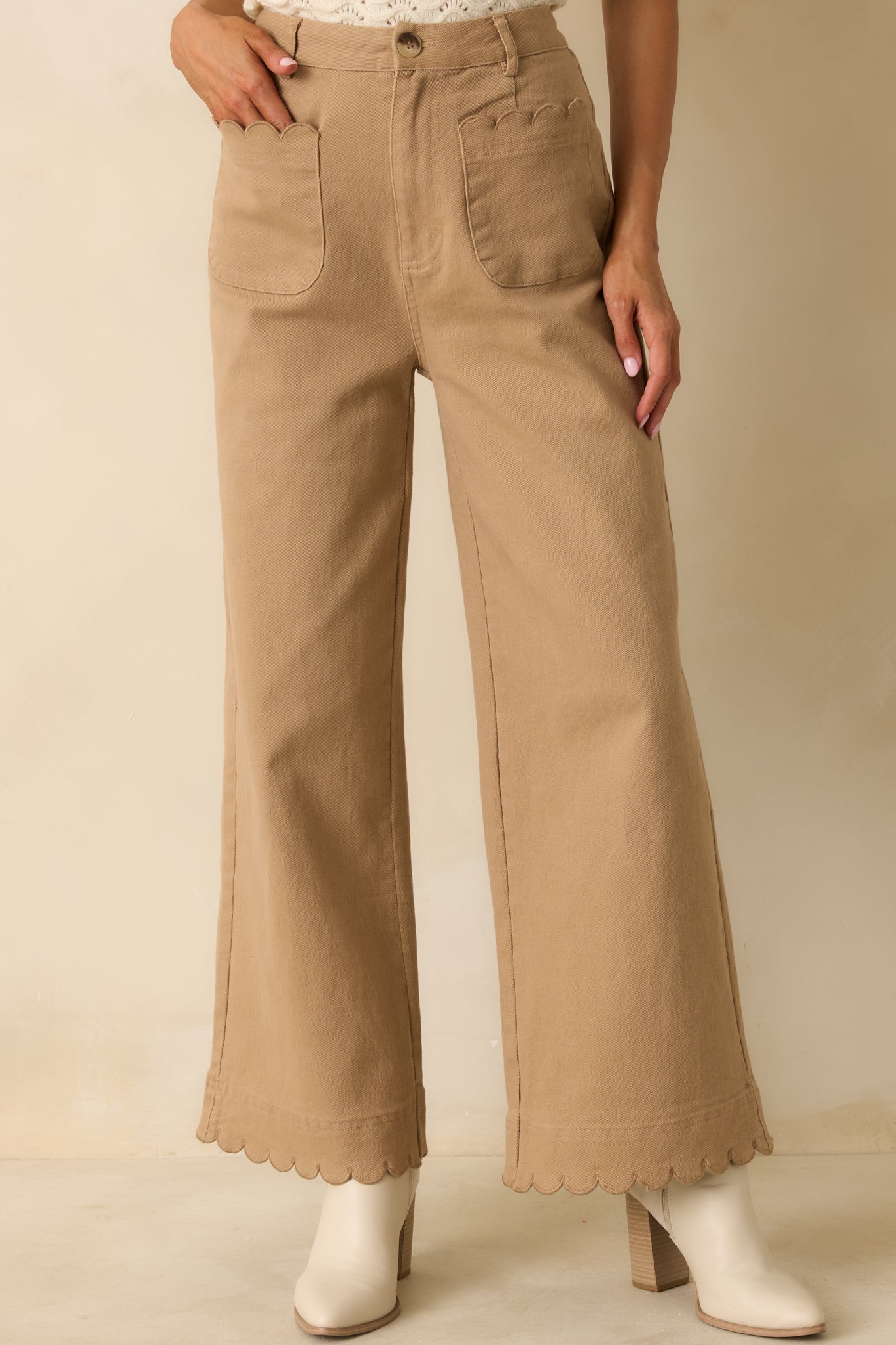 Front angle showing high-waisted shape and belt loop accents.