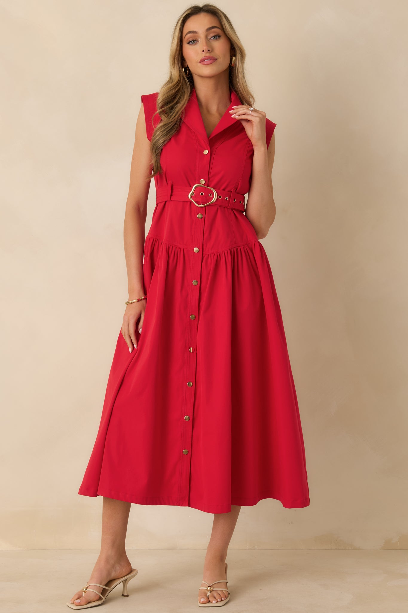 Straight-on front angle showing the clean button placket and crisp collar detail of the red shirt dress.