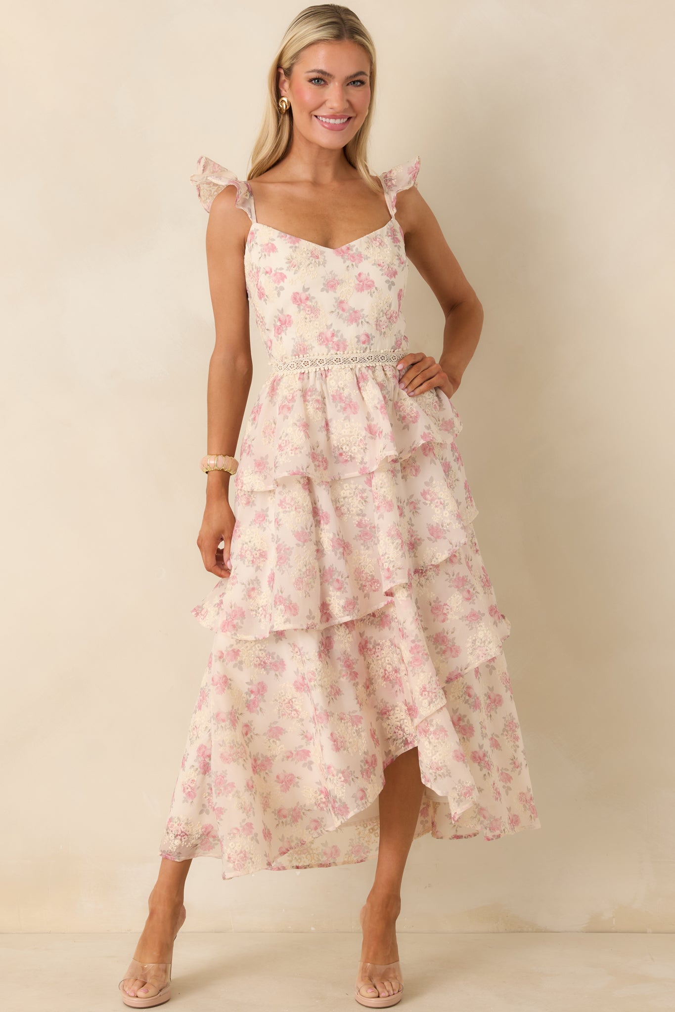 Front-facing angle showing the tiered construction and open ladder-lace detail at the waist.