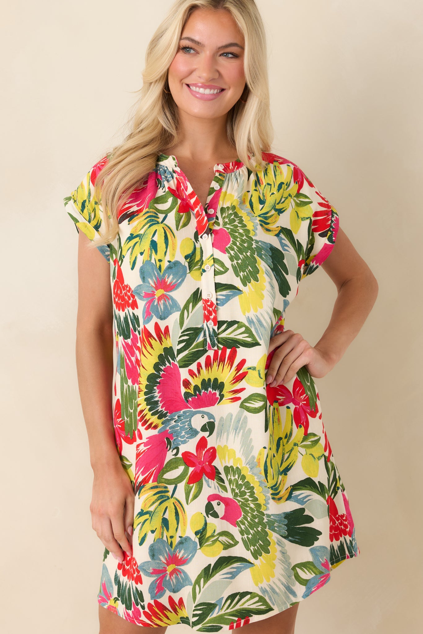 Front cropped detail of mini dress emphasizing lightweight fabric and hidden side pocket