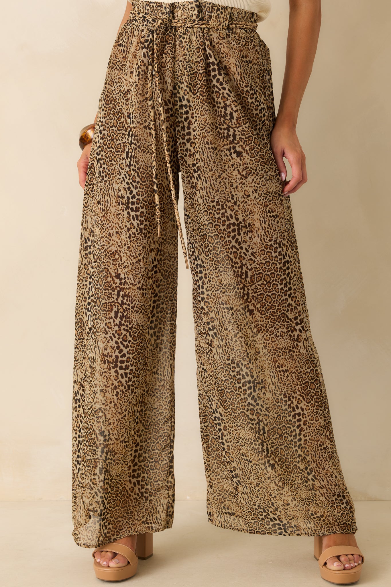 Front cropped view showcasing the wide leg drape and airy fabric movement.