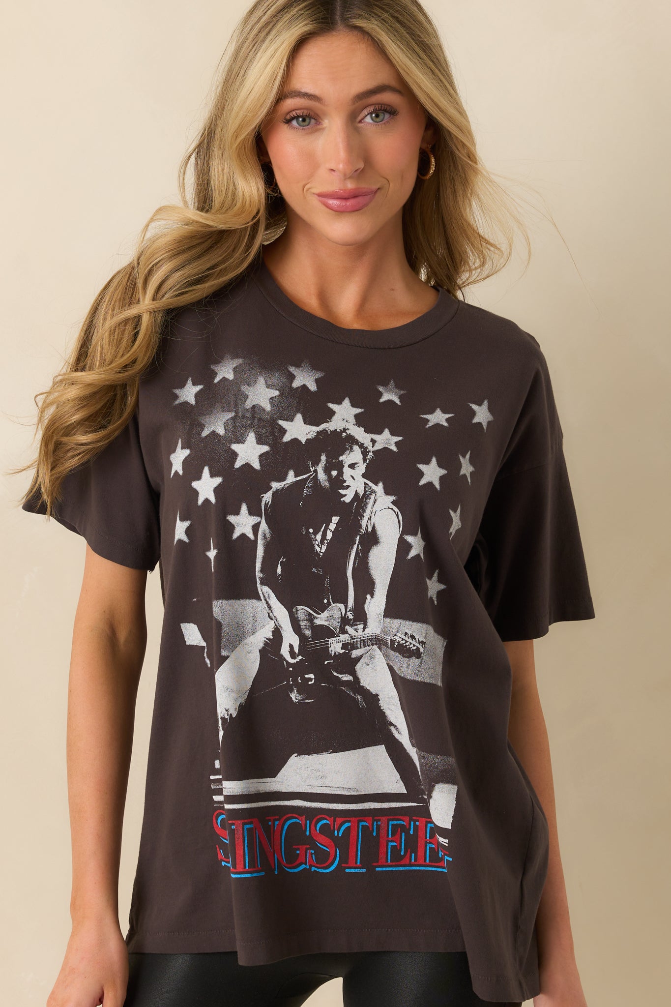 A cropped shot showing the straight hemline and lower portion of the front design.