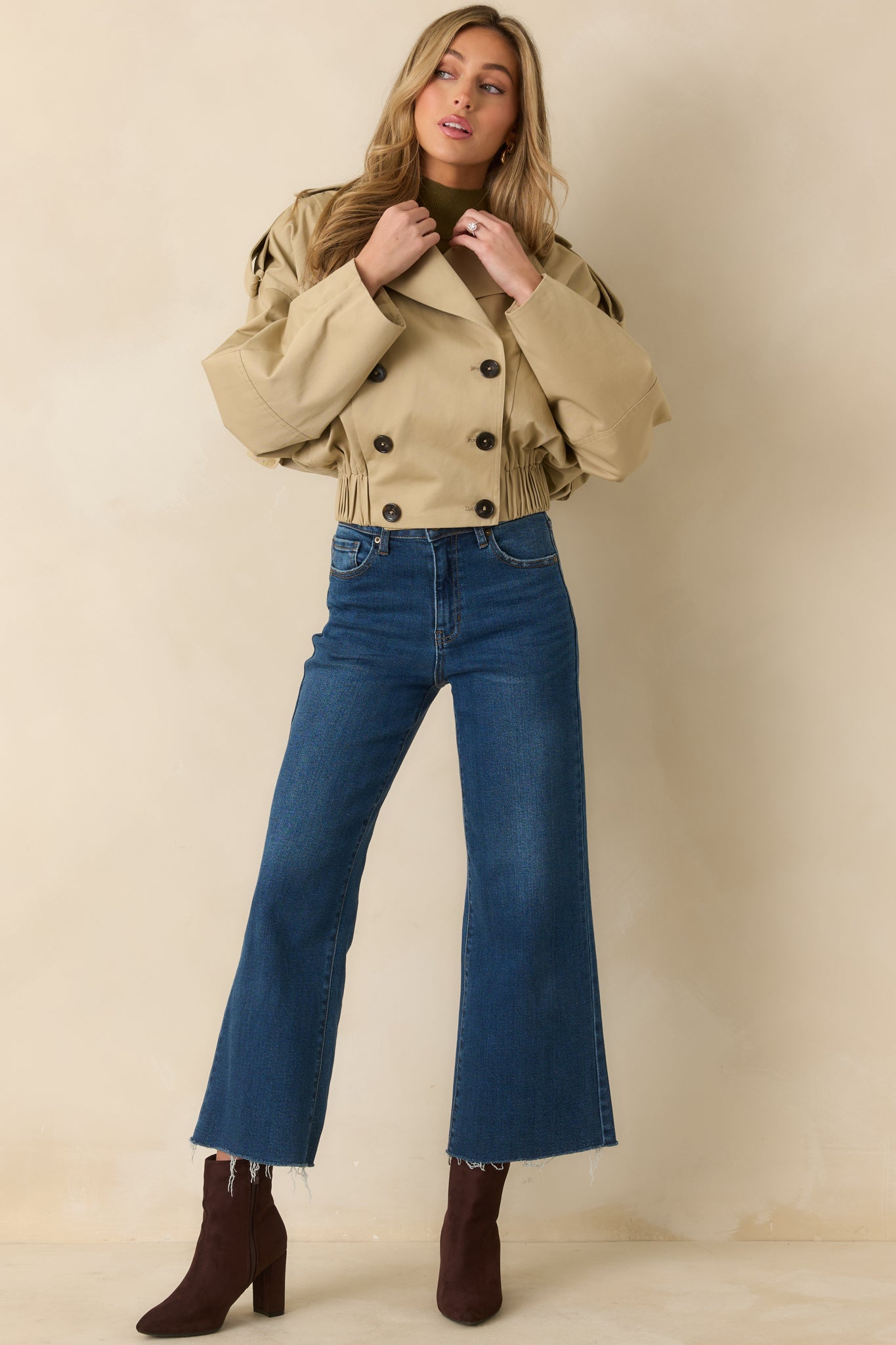 Front-facing full body shot highlighting notched lapels, cotton texture, and functional side pockets.