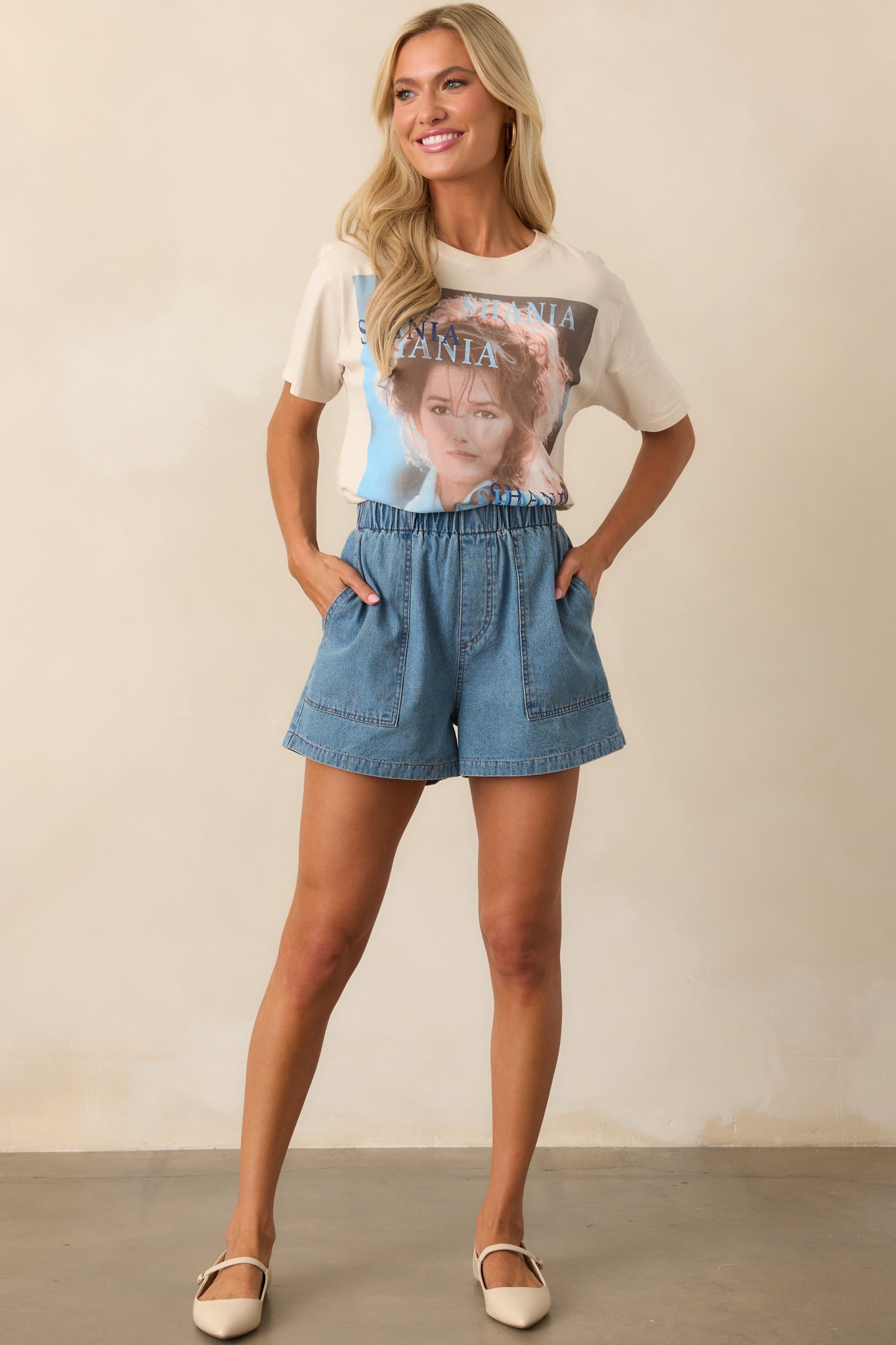 Front-facing view of the ivory tee, showcasing the album cover on the front and a comfortable crew neckline with short sleeves.