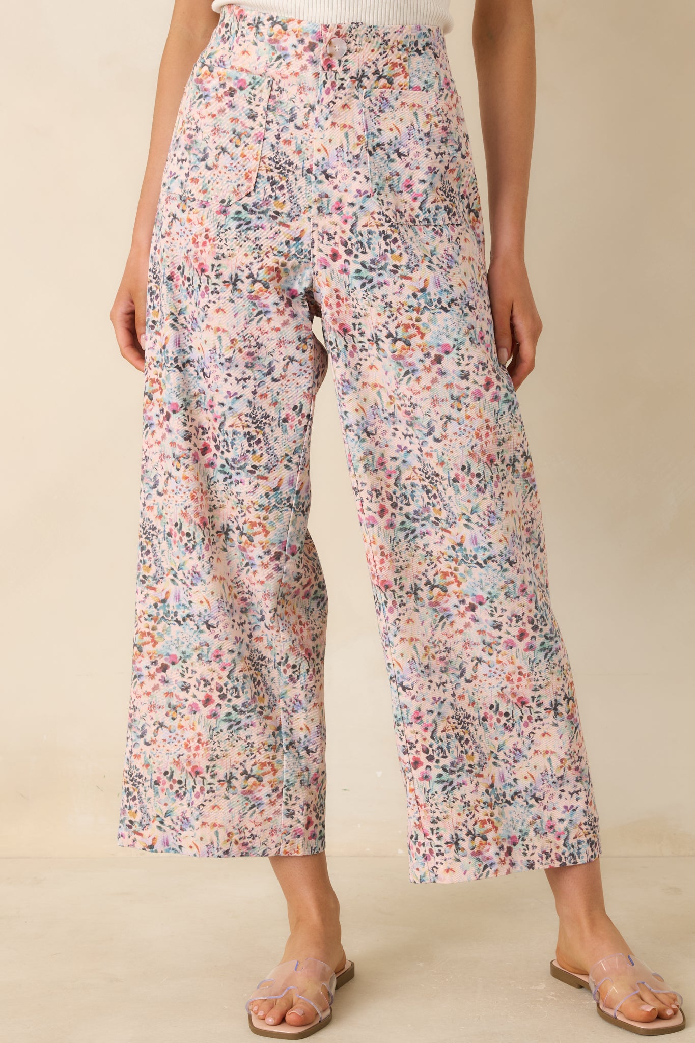 Front focus on wide leg shape and relaxed drape through the legs.