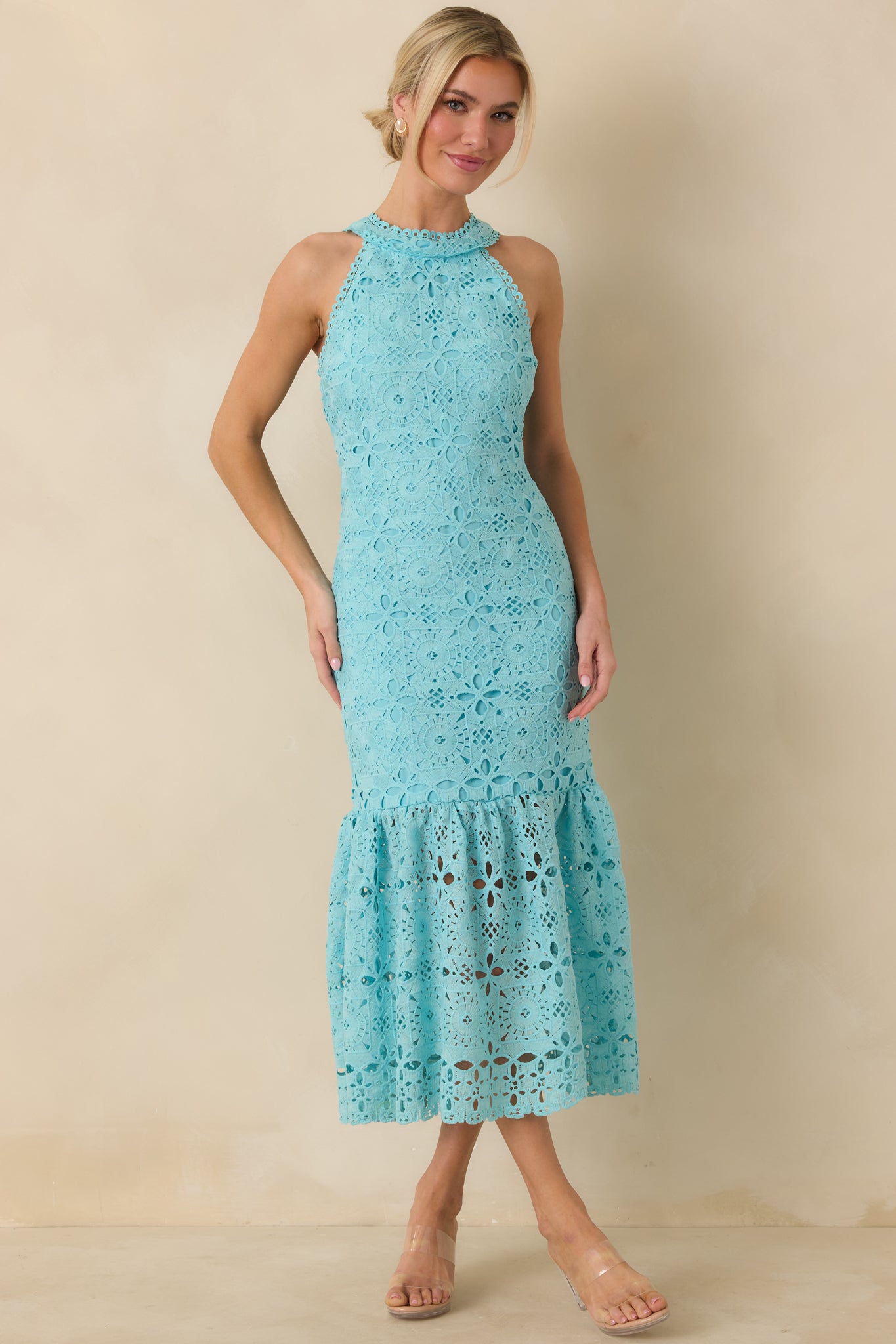 Front view of horizon blue maxi dress highlighting the halter neckline and fitted silhouette.