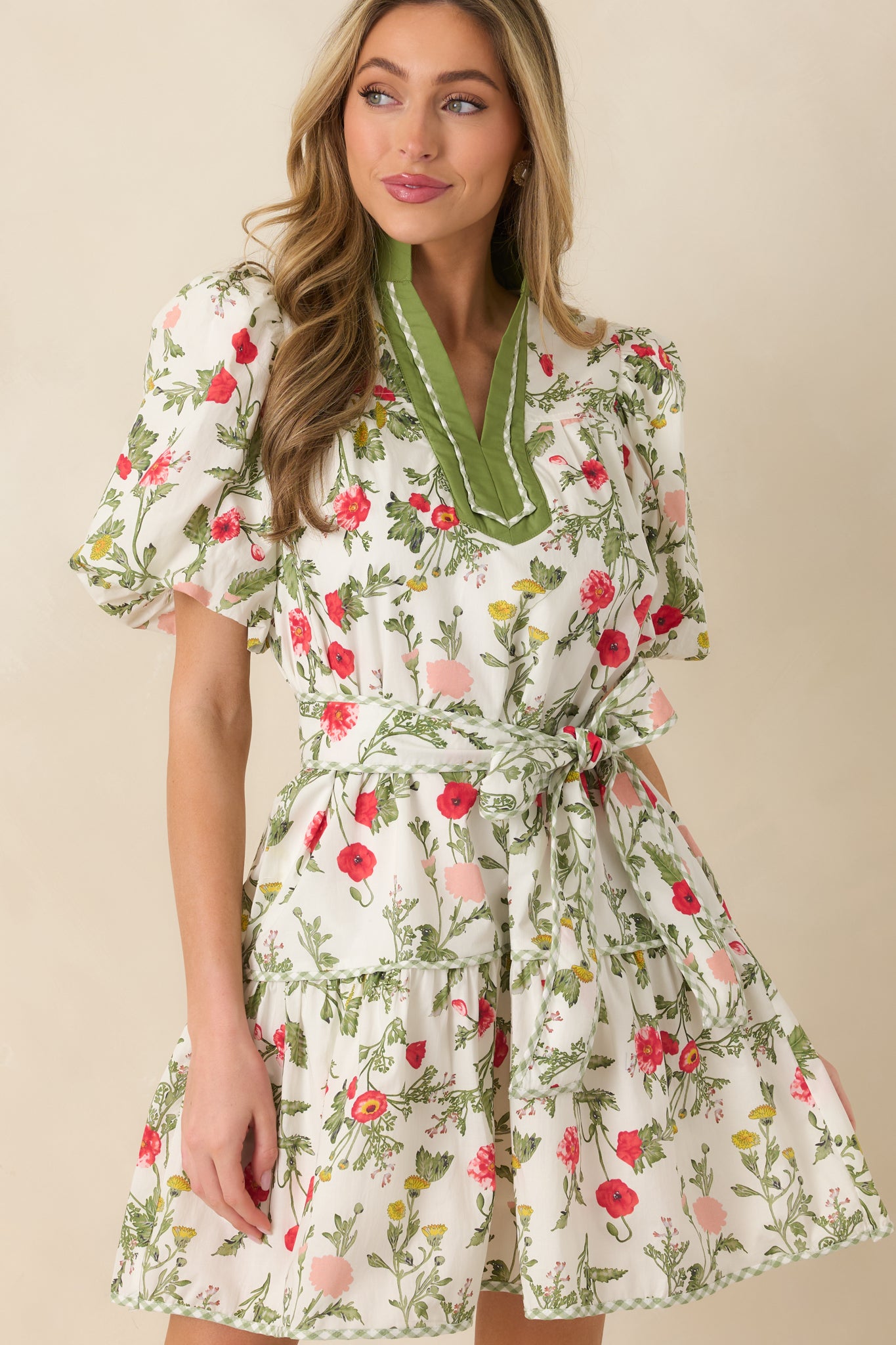Cropped front image emphasizing the optional floral belt with gingham trim accents.